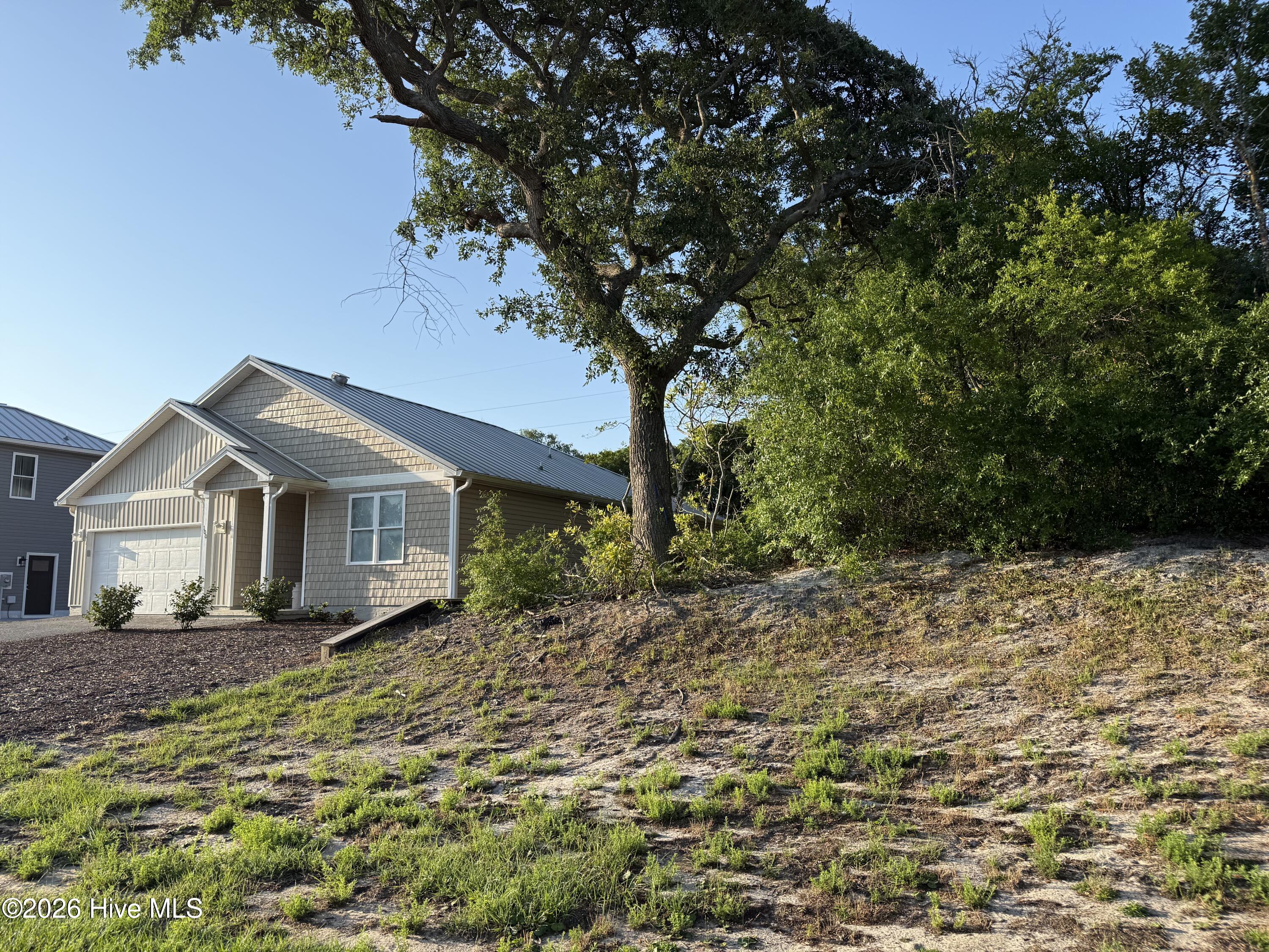 100 Evergreen Lane, Pine Knoll Shores, NC 28512