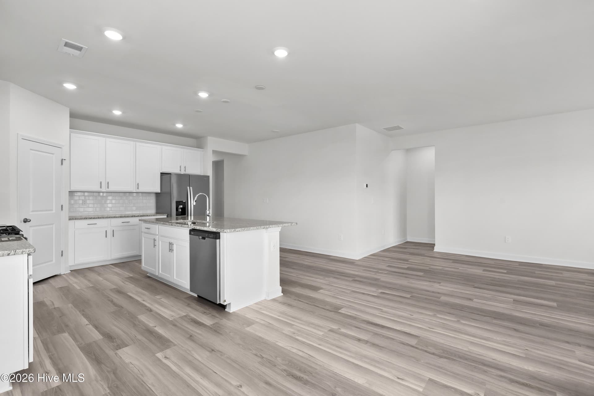 Photo is not of the actual home, but is an example photo of a completed home and may depict options and/or features that are not included - 4154 Generations Circle NW, Ash, NC 28420