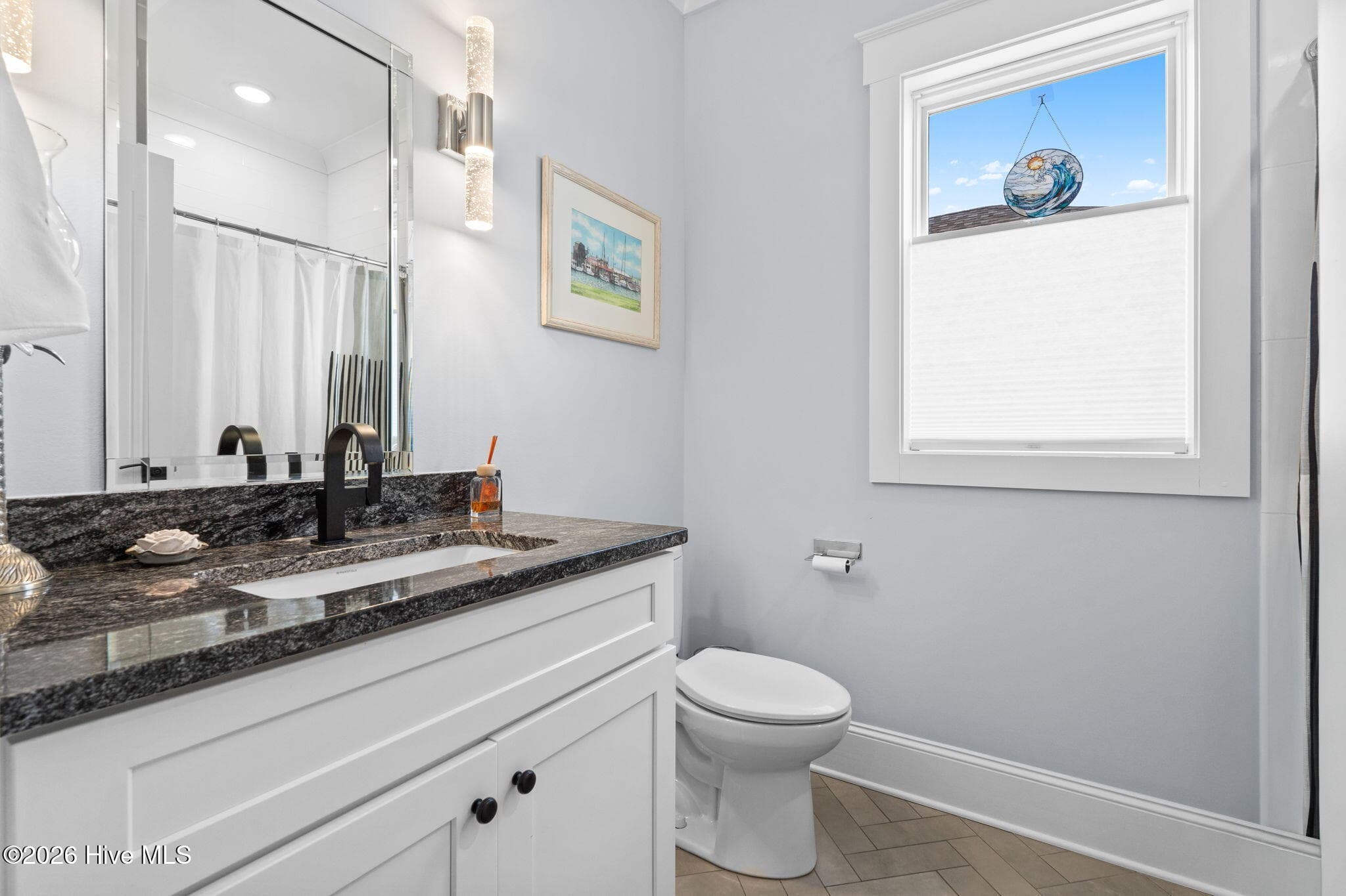 Single sink with granite counter plus a shower if you need an extra bedroom - 2775 Long Bay Drive SE, Southport, NC 28461