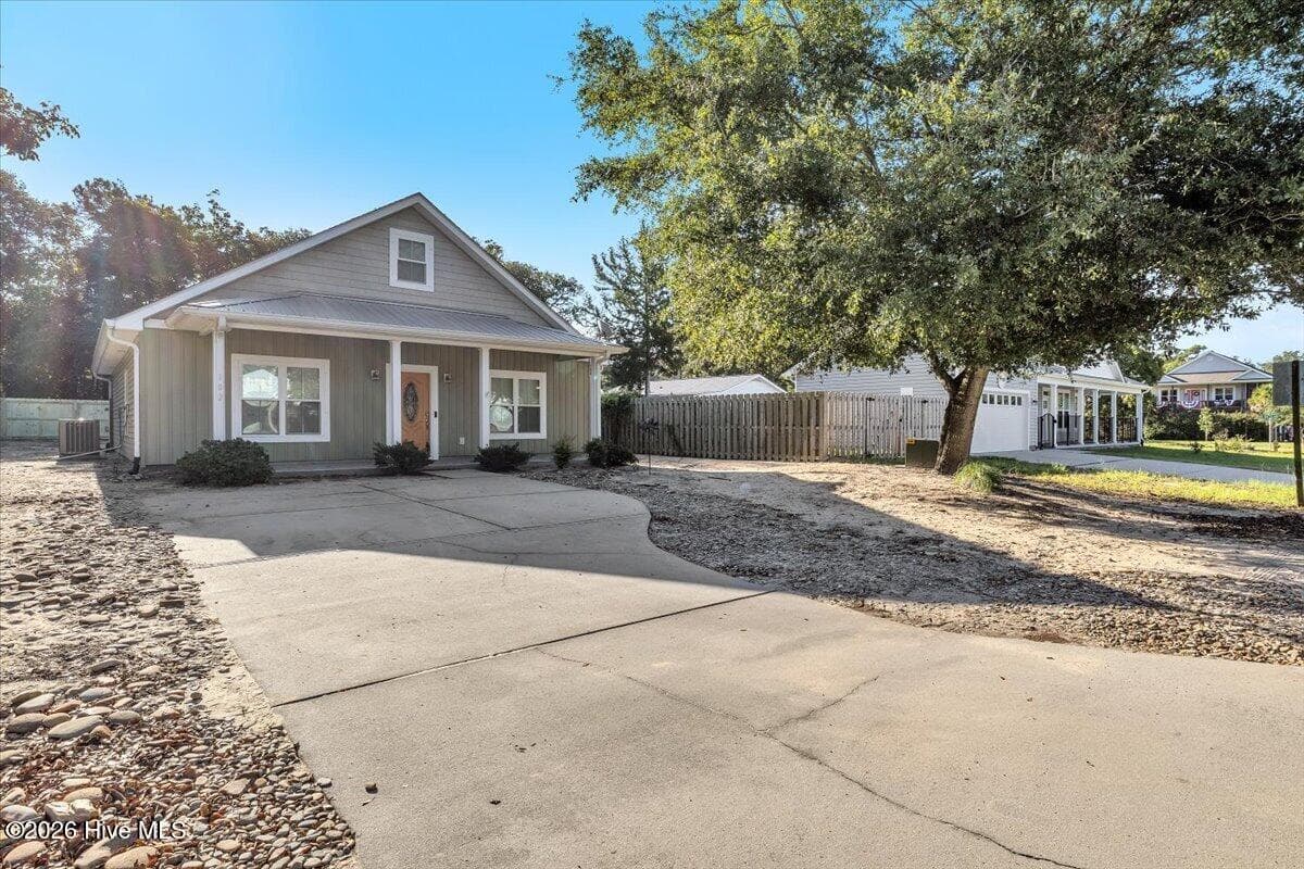 Single Family Residence at 102 NW 4th Street, Oak Island, NC 28465, photo 4 of 61
