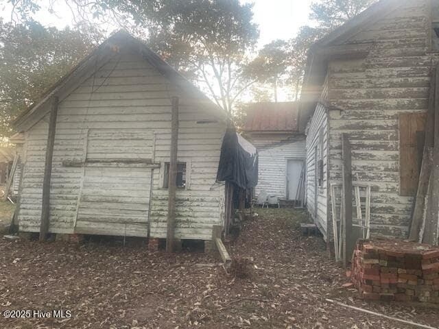 Original home showing detached summer kitchen - 1890 Oneal Road, Whitakers, NC 27891