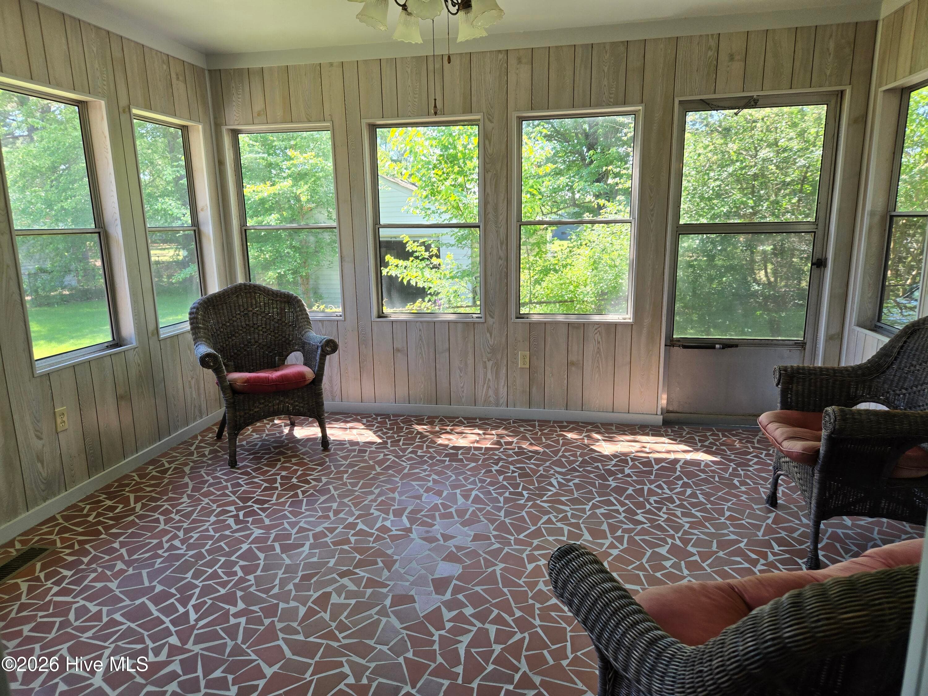 Sun room has heat and air, torazzo floor and is located off family room - 725 Clayton Street, Rocky Mount, NC 27803