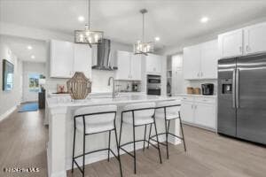 This is a photo of a staged version of this floorplan. The specific finishes and selections can vary for this specific home. - 6259 Raystone Way, Leland, NC 28451