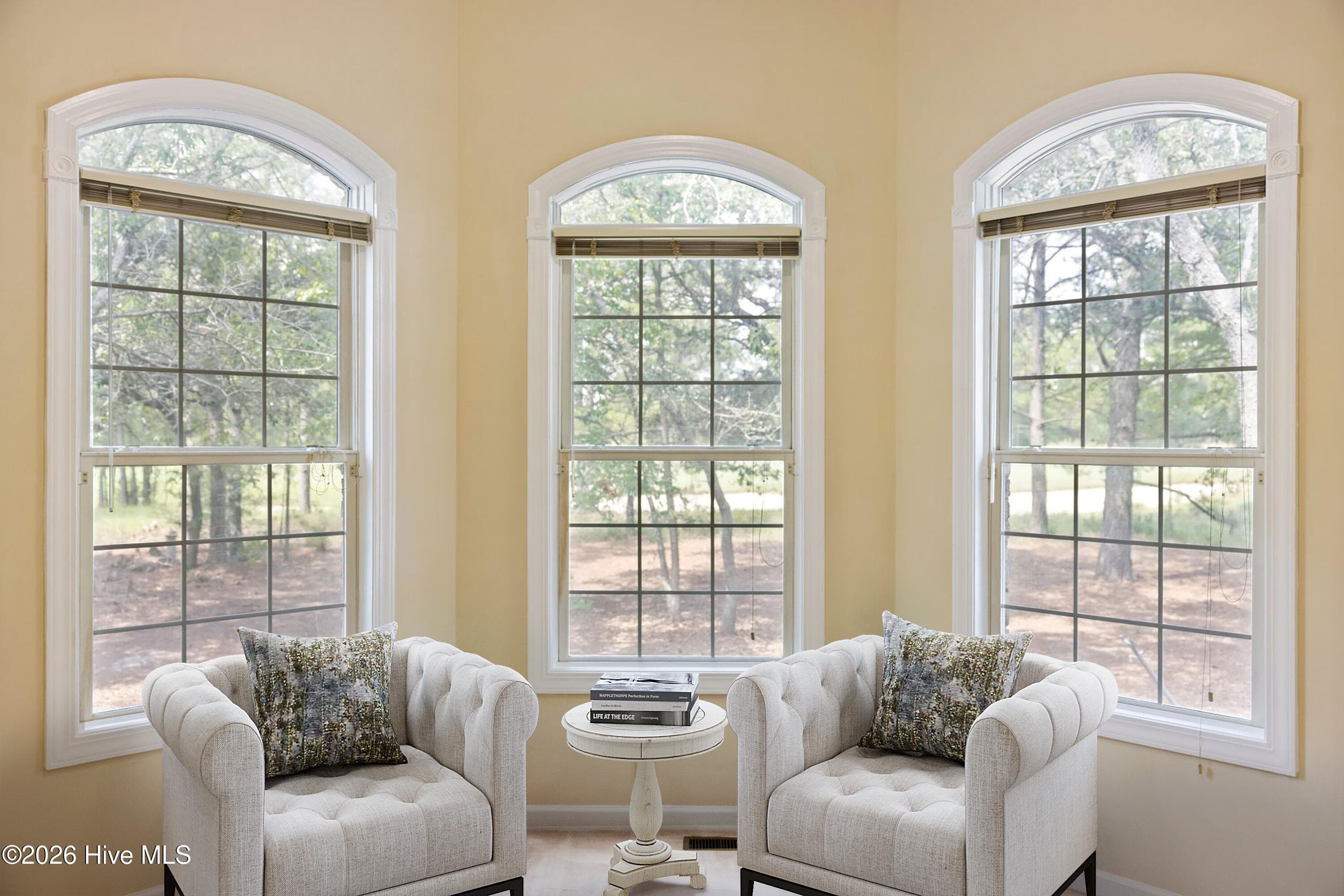 Primary Bedroom Sitting Area virtual staging - 1834 Quail Point SE, Bolivia, NC 28422