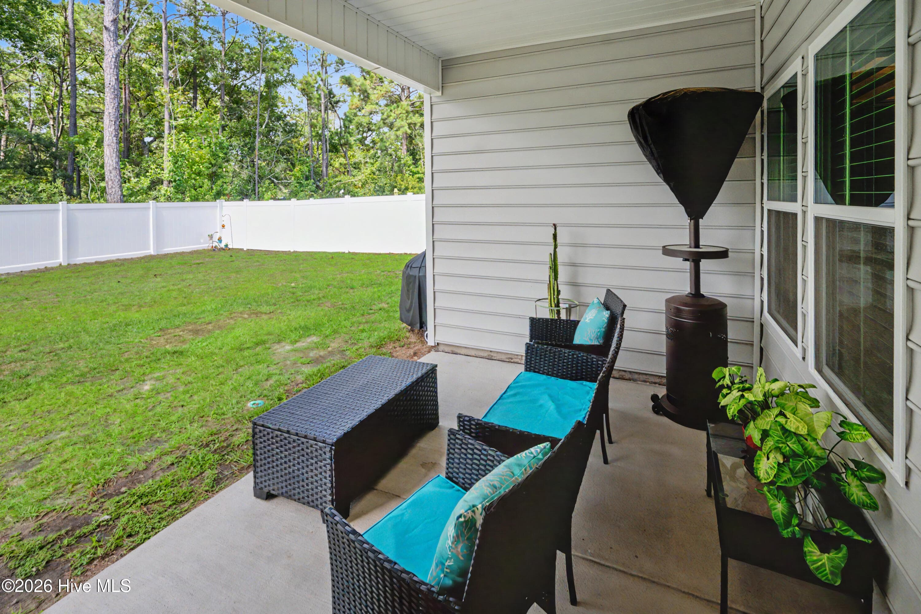 Covered porch overlooking huge fenced in yard! - 9056 Island Shore Avenue, Calabash, NC 28467