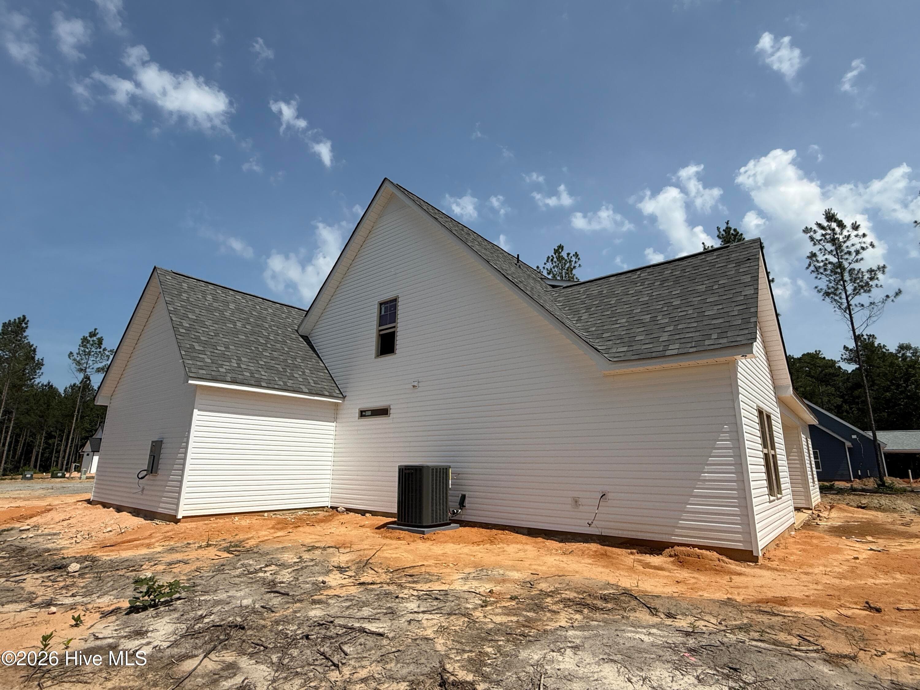 side of home - 215 Whispering Ridge, West End, NC 27376