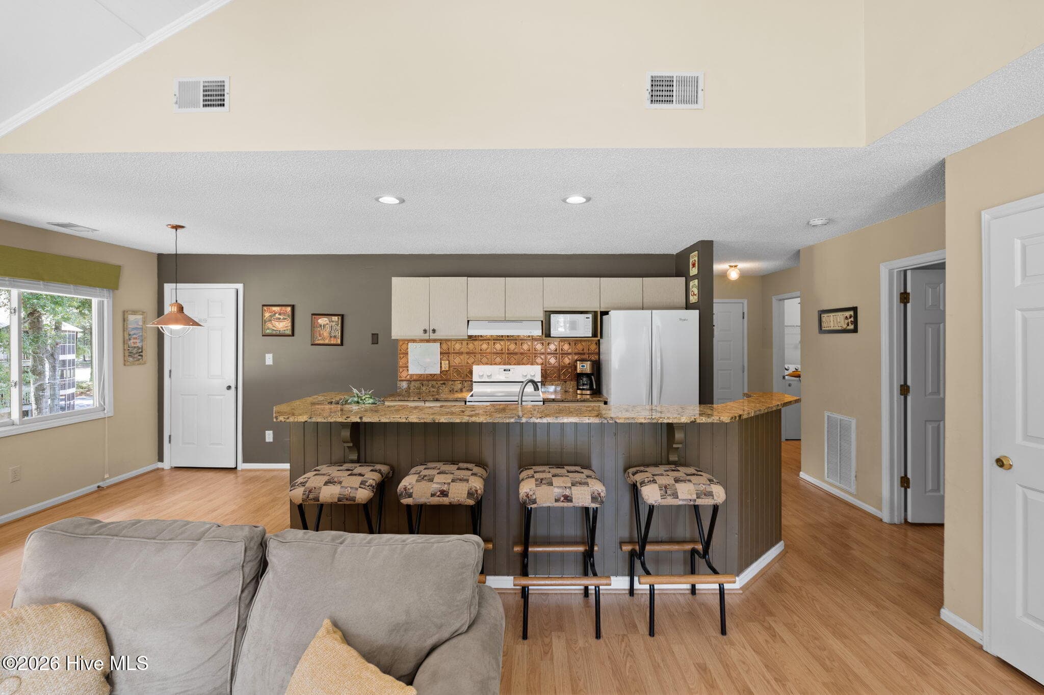 Dinning area to left - 804 Colony Place SW # F, Sunset Beach, NC 28468