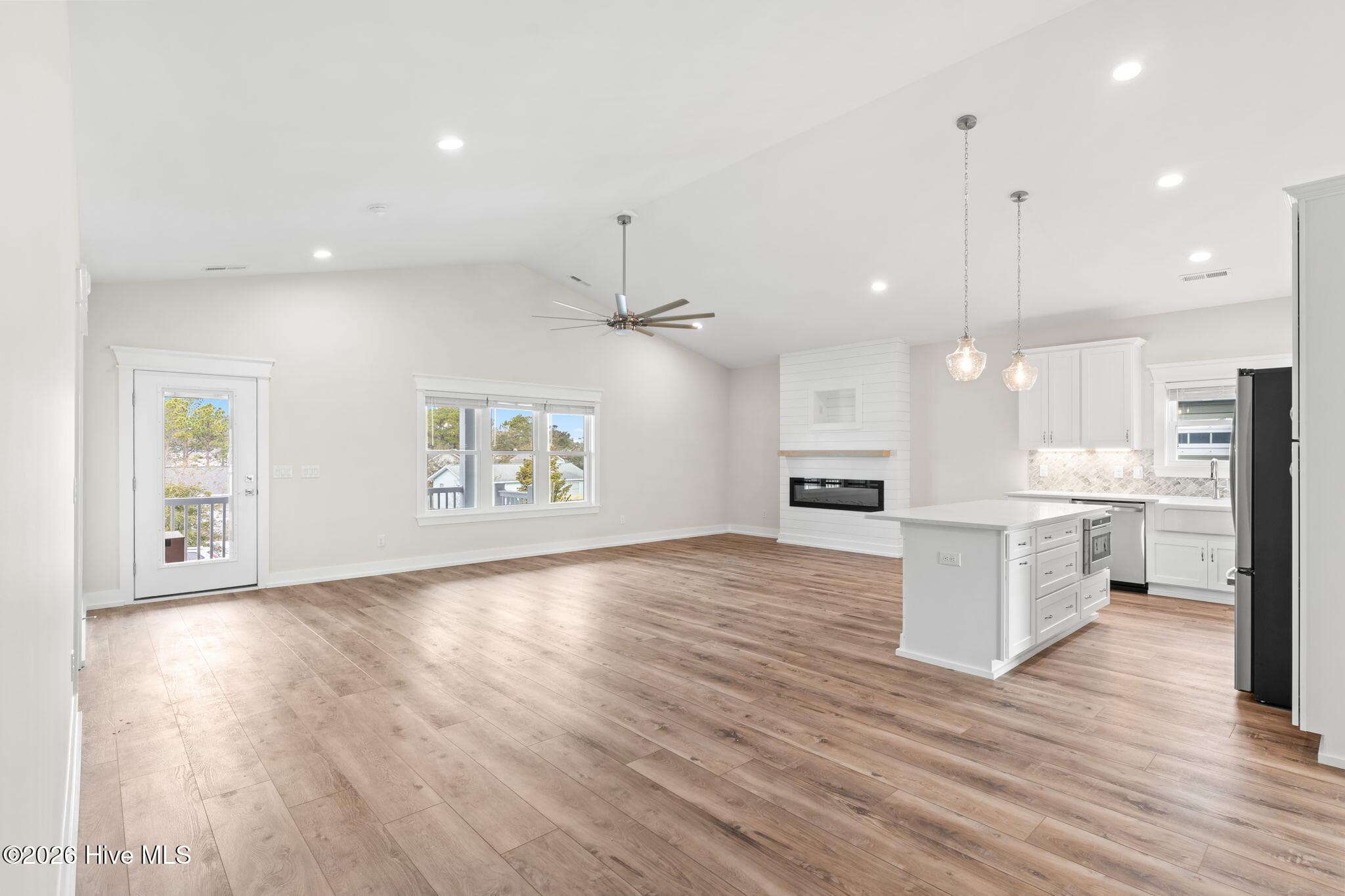 Photo is for illustrative purposes only of a similar home of same plan - 310 NE 58th Street, Oak Island, NC 28465