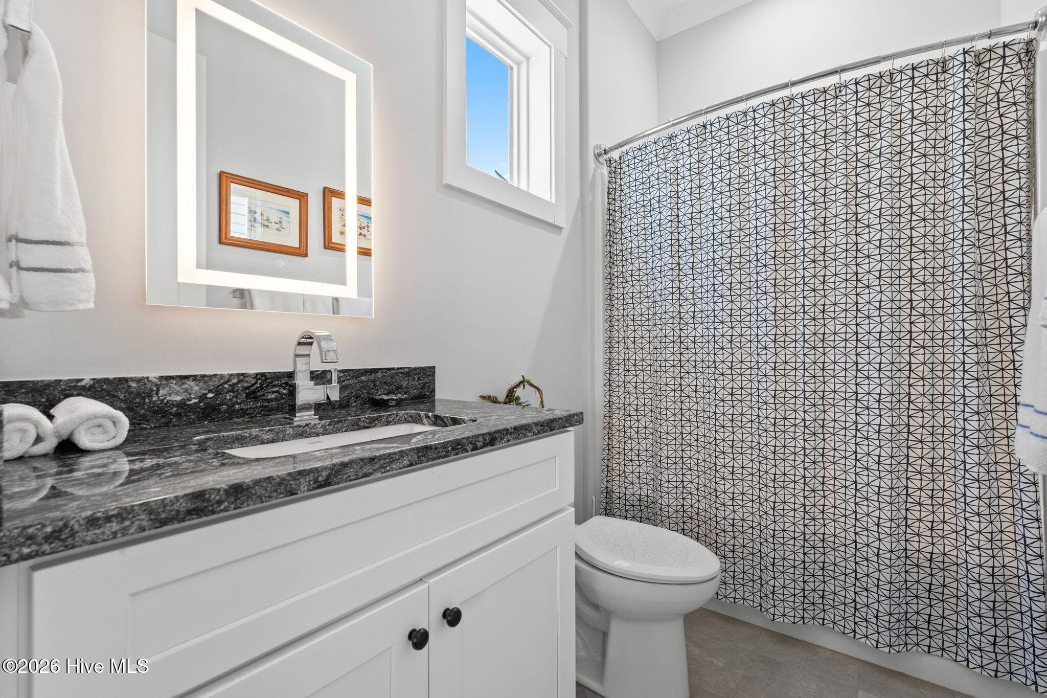 Private bathroom with shower/tub and single vanity - 2775 Long Bay Drive SE, Southport, NC 28461
