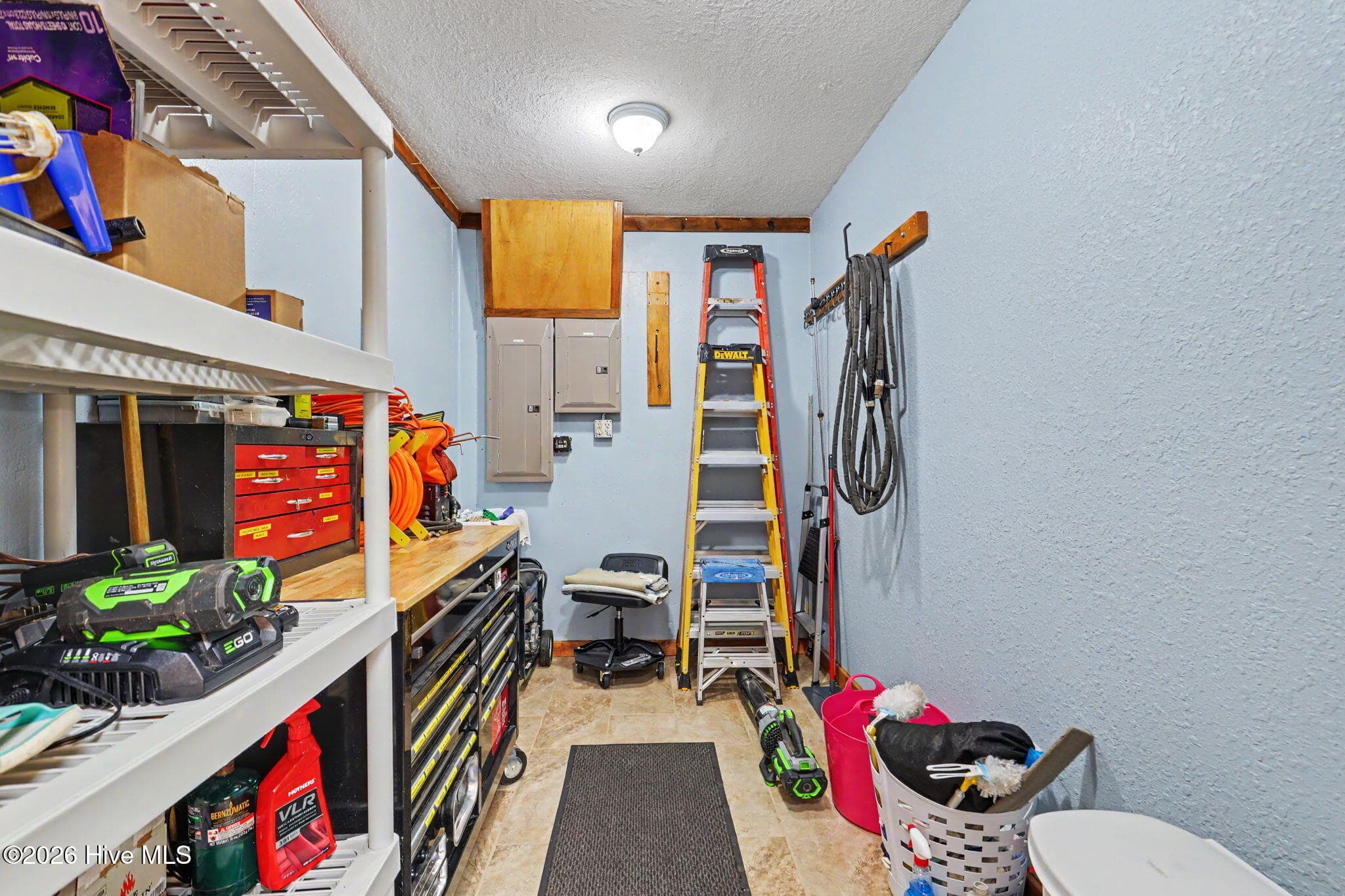 Workshop and storage area adds valuable functional space. - 210 Majestic Drive, Hayesville, NC 28904