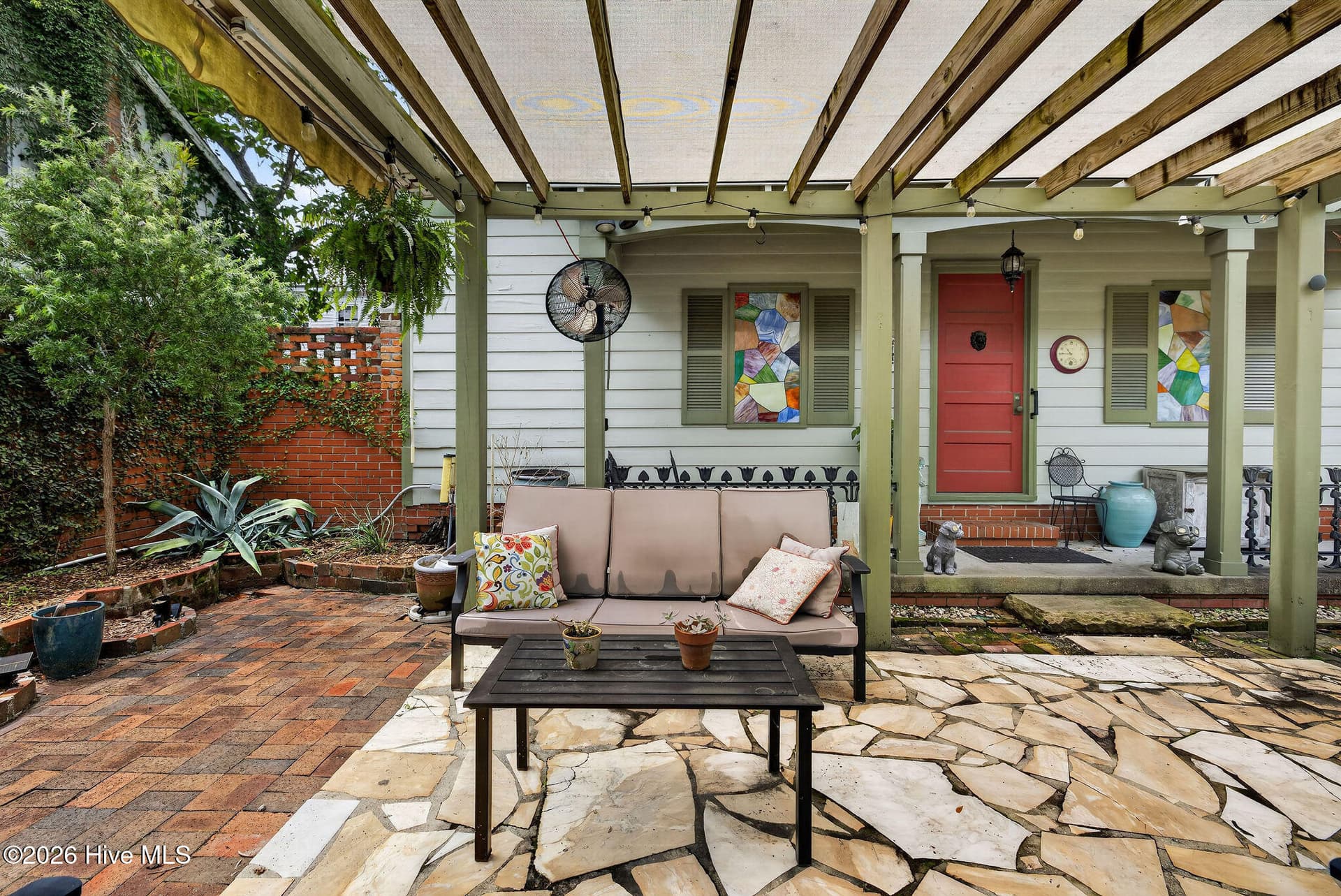 View of detached garage and shaded trellis social area - 5 N 20th Street, Wilmington, NC 28405