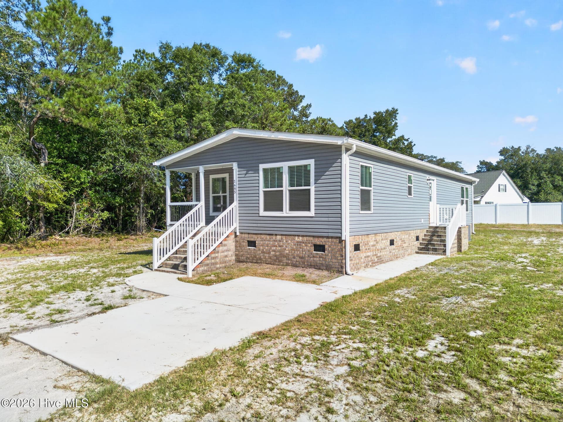 Manufactured Home at 1685 Elon Drive SW, Supply, NC 28462, photo 2 of 34