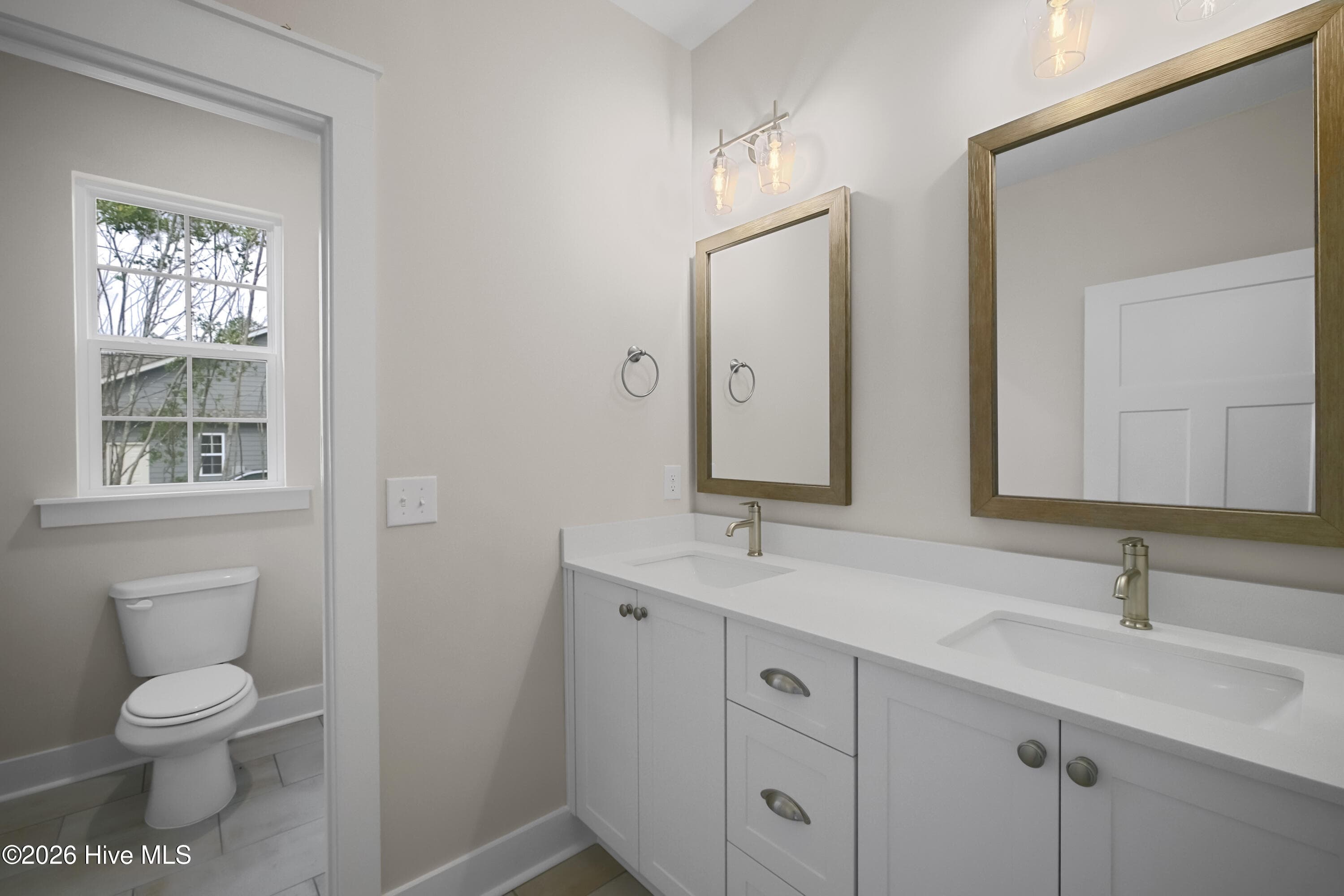Hall bath, door to toilet and shower unit for added privacy - 1200 Bellingham Drive, Beech Island, SC 29842