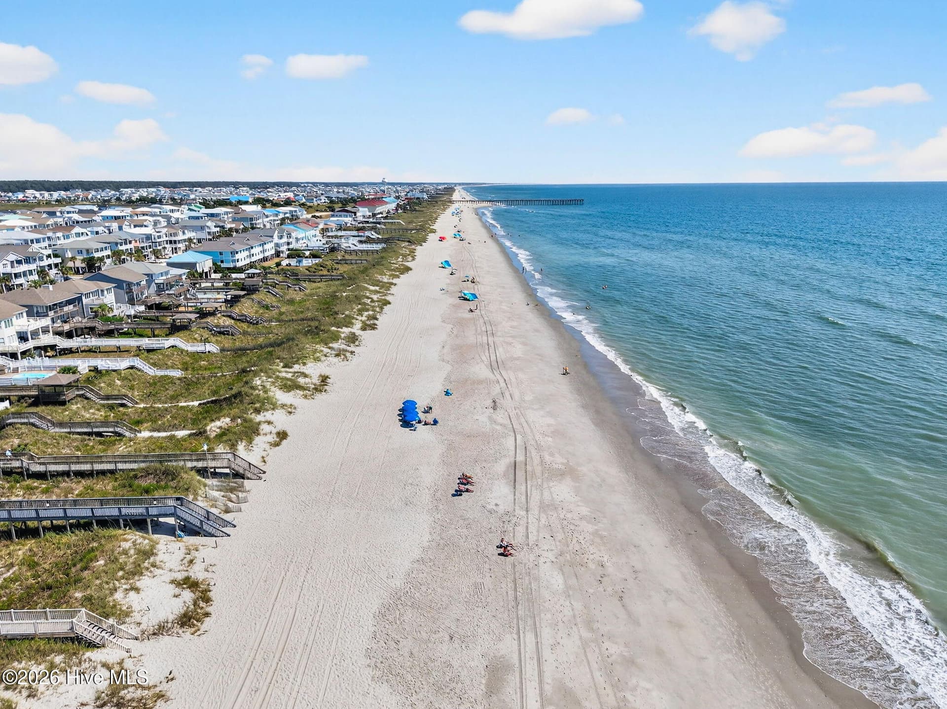 From peaceful beach mornings to days spent along the Atlantic, the Ocean Isle Beach lifestyle is just minutes from your front door. - 1650 Frink Street SW, Ocean Isle Beach, NC 28469