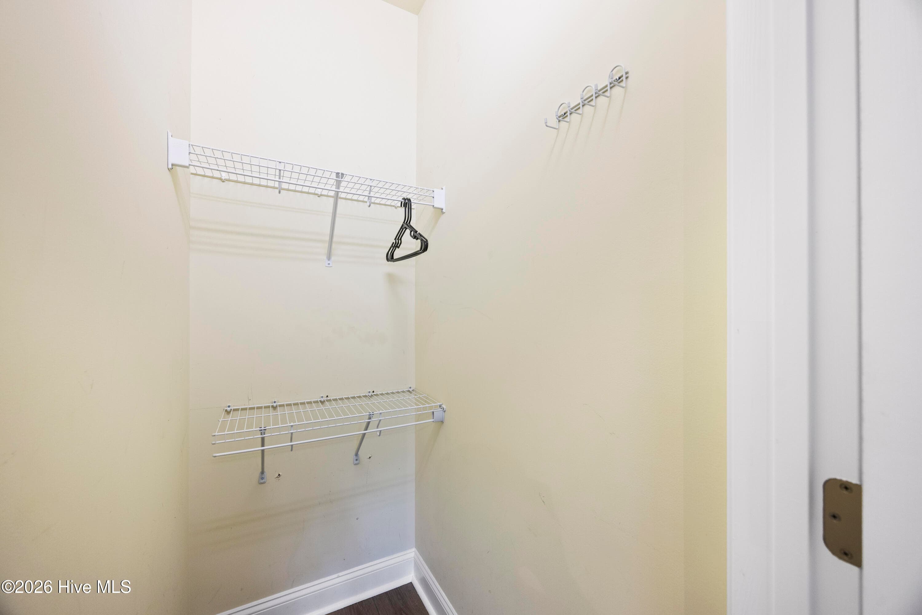 PRIMARY BEDROOM's Walk-In Closet - 225 NE 39th Street, Oak Island, NC 28465