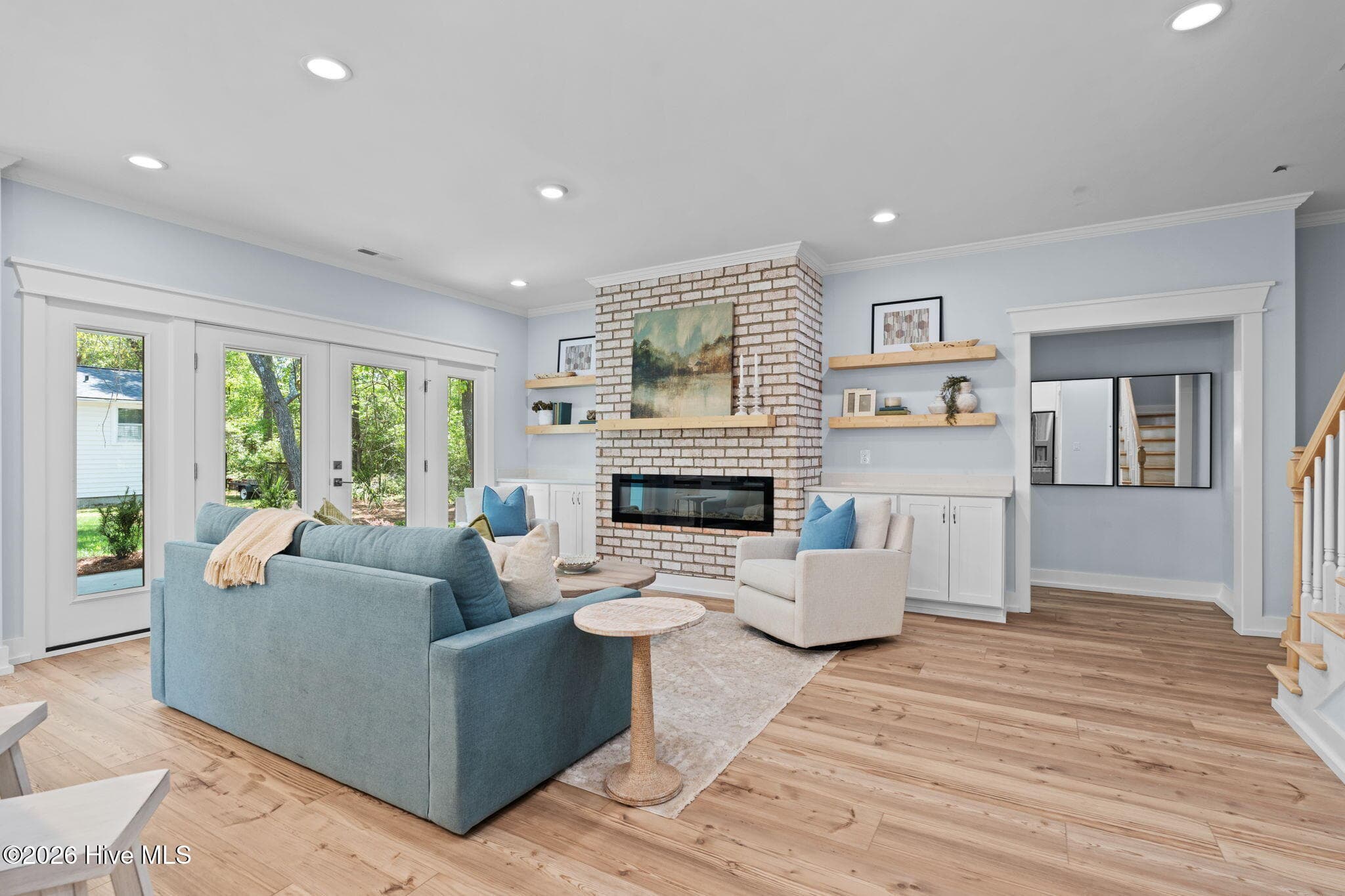 Photos of a staged model of the exact same plan - 312 NE 58th Street, Oak Island, NC 28465