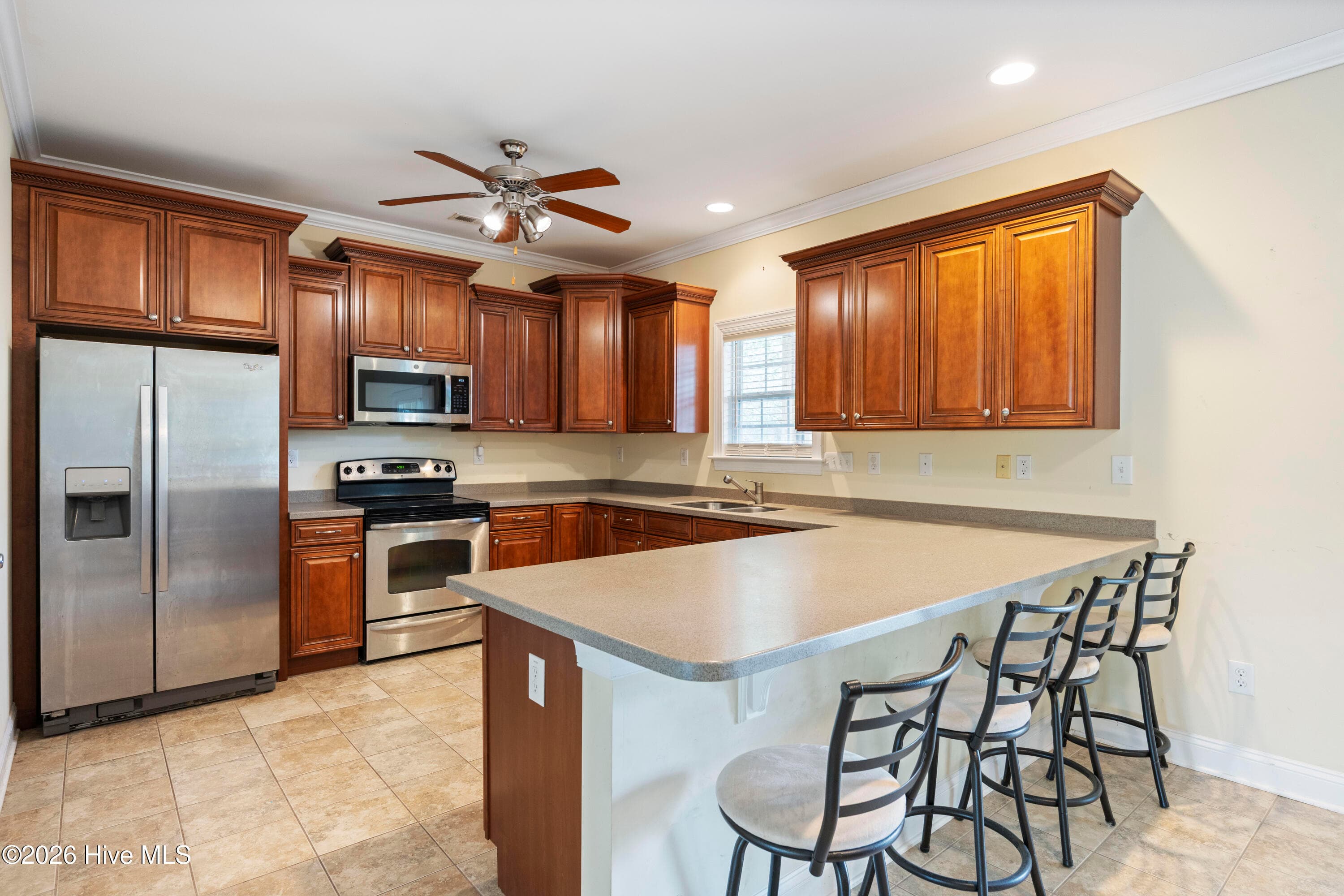KITCHEN with Seating at Counter - 225 NE 39th Street, Oak Island, NC 28465