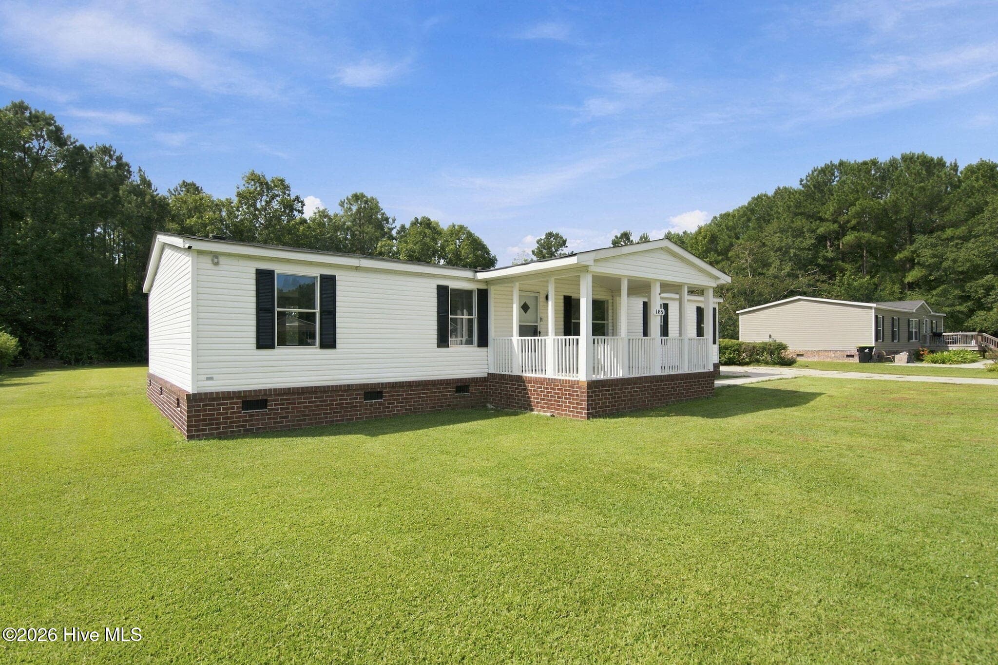 Manufactured Home at 185 New Hope Lane SE, Leland, NC 28451, photo 2 of 49