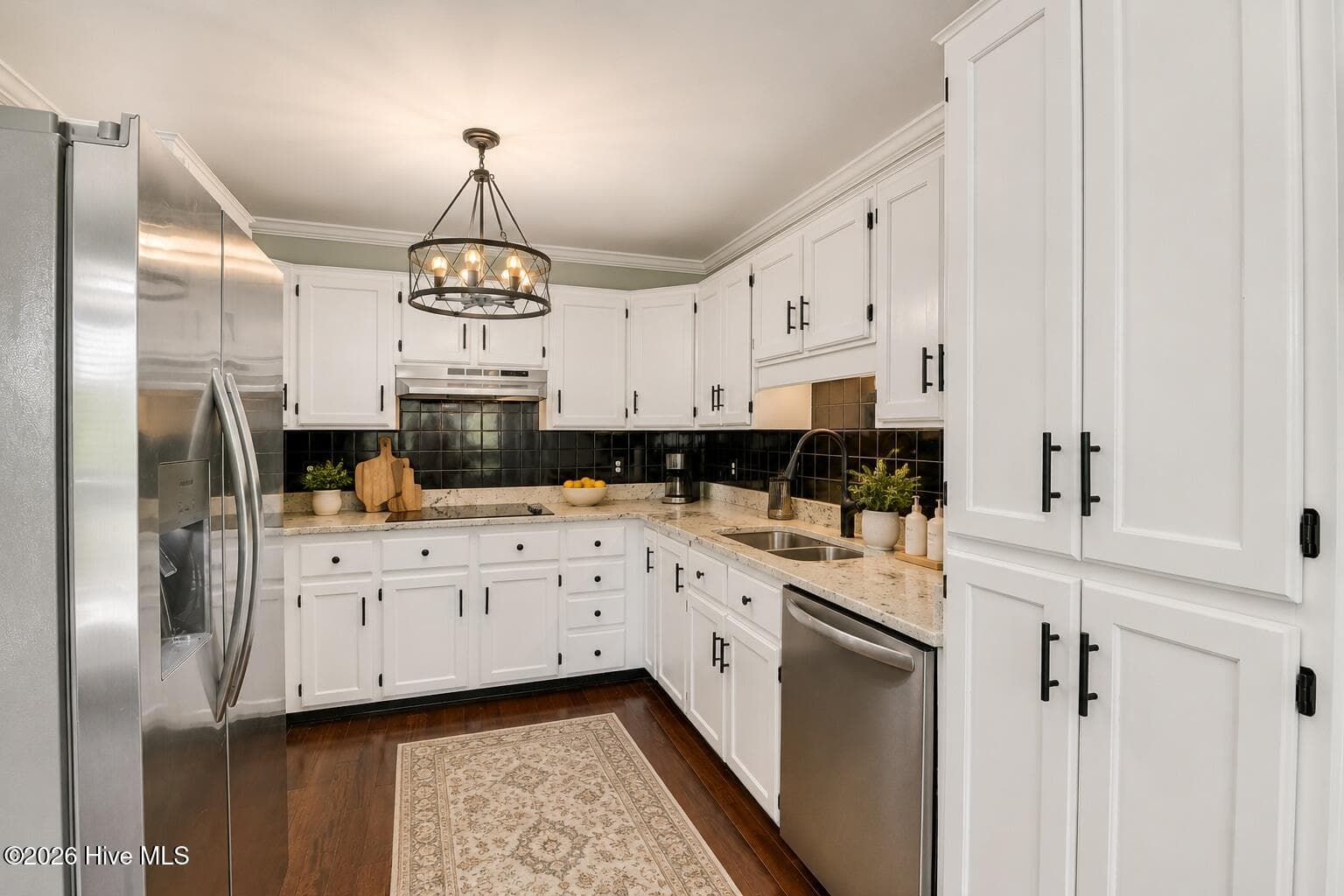 A bright, efficient kitchen layout with abundant cabinetry, updated finishes, and a clean modern look buyers will love. - 16 Rapids Court, North Augusta, SC 29841