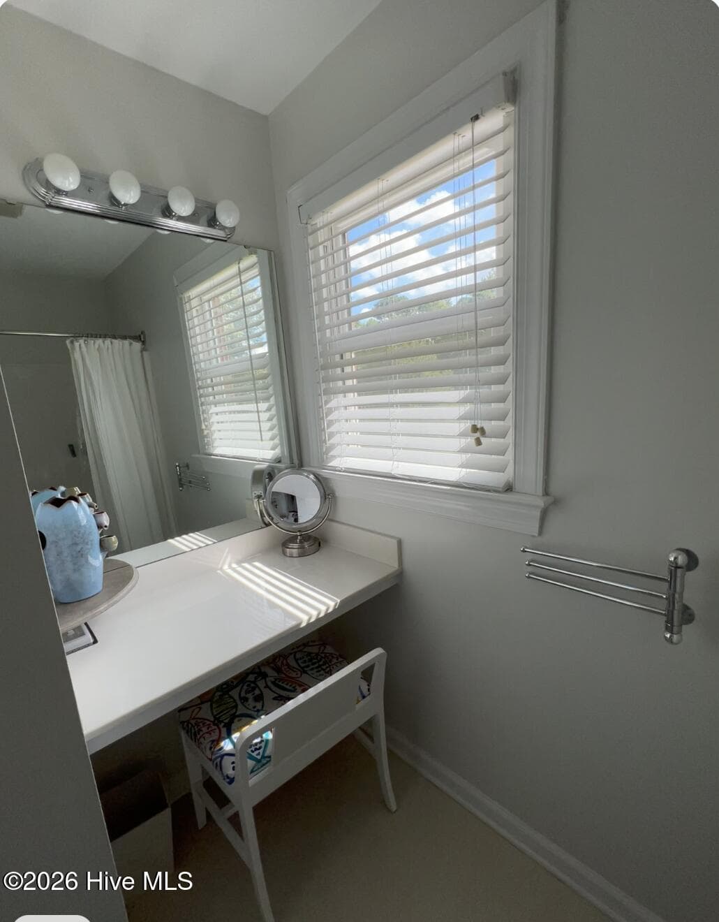 Bathroom makeup cabinet with mirror. - 642 Enoch Road, Clinton, NC 28328
