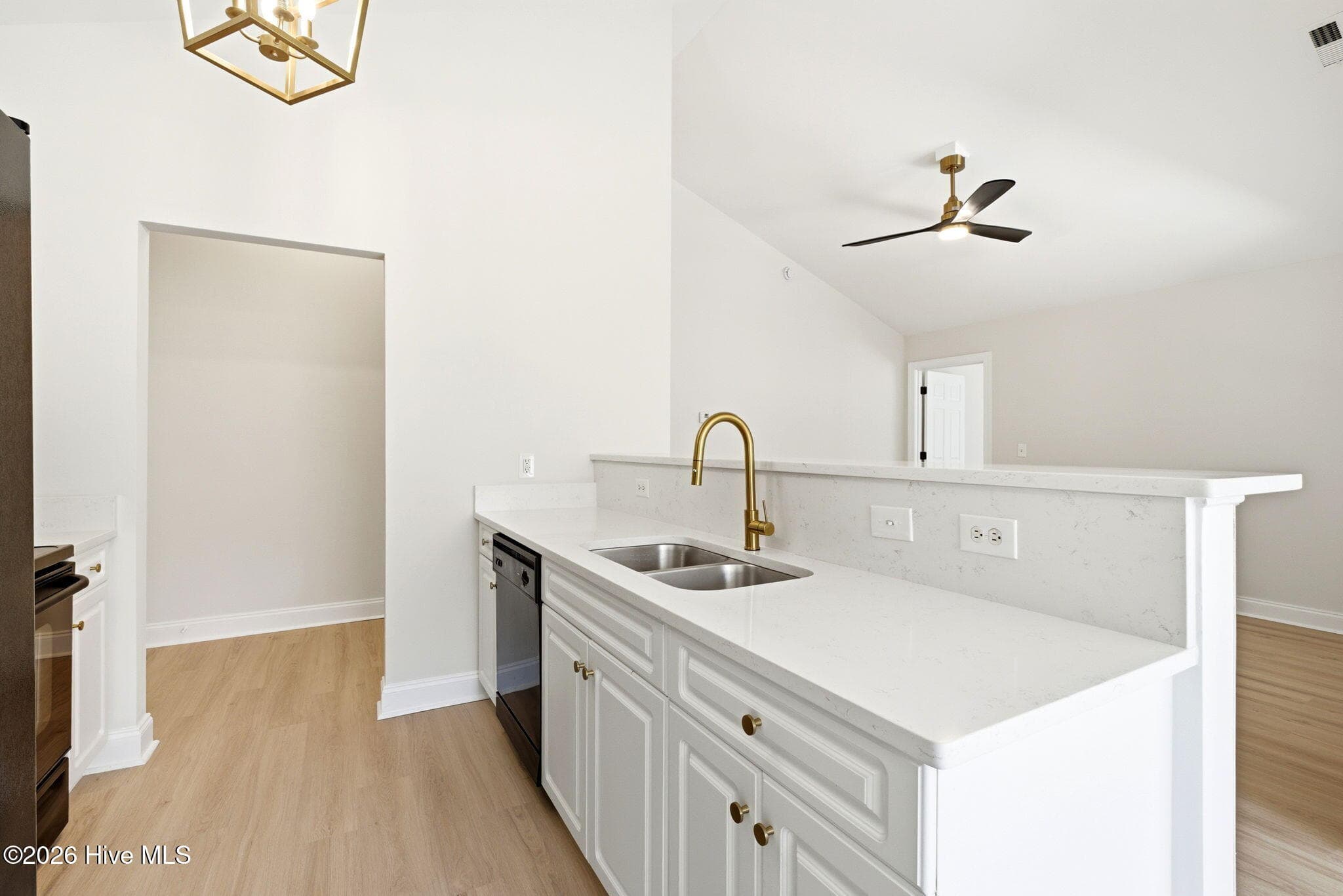 Kitchen and Great Room - 215 Gardenview Court NE, Leland, NC 28451