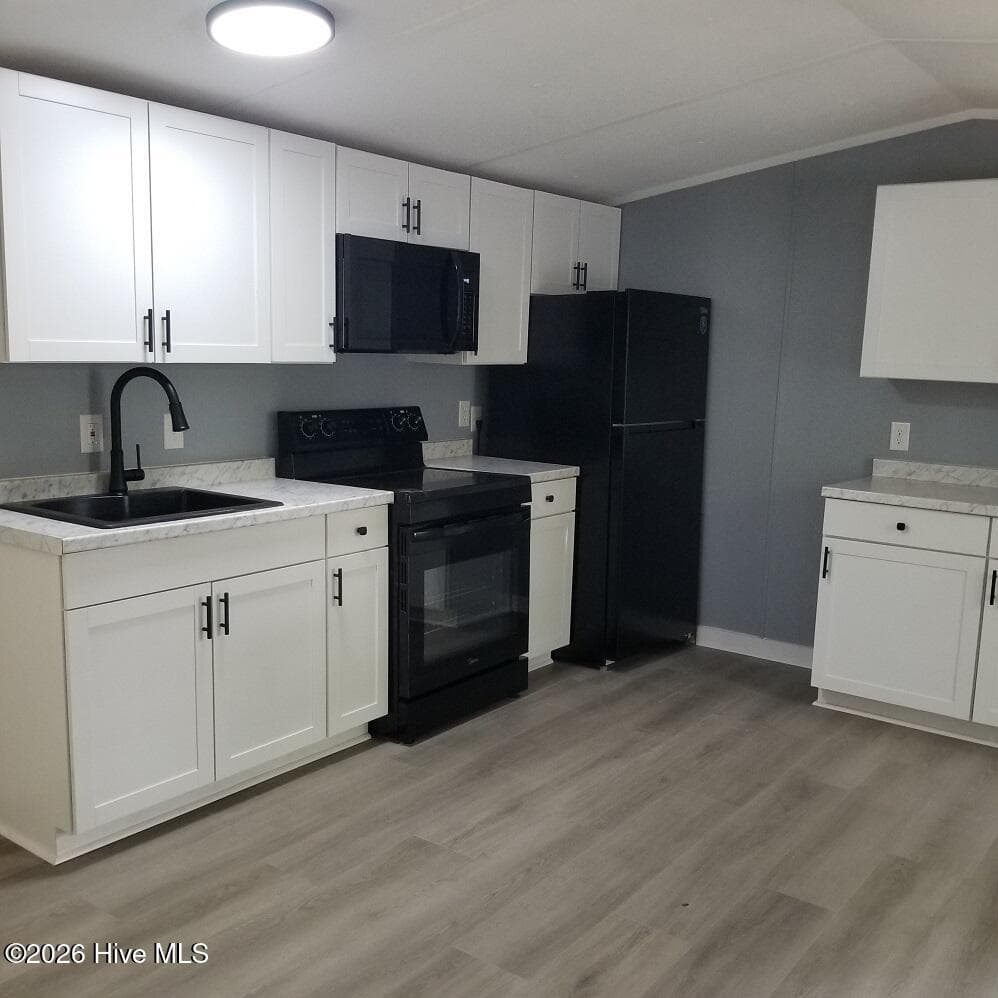 Manufactured Home at 232 Lake Drive SW, Supply, NC 28462, photo 6 of 36