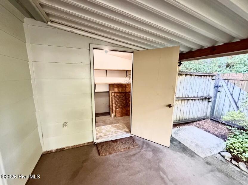 Storage closet beside patio - 4908 Marlin Court, Wilmington, NC 28403