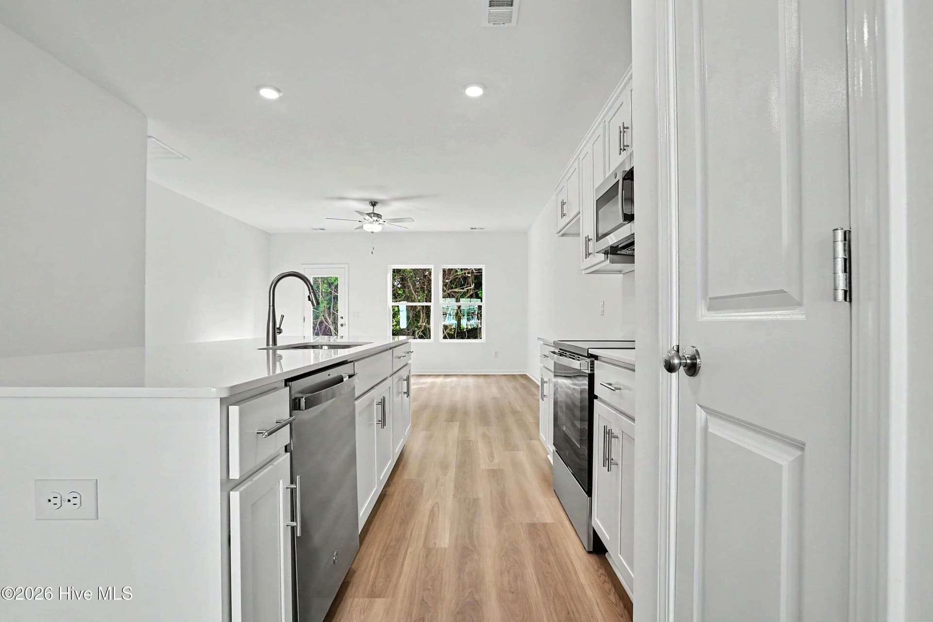 Kitchen open to Dining and Great Room - 139 Edom Lane Unit 3, Shallotte, NC 28470
