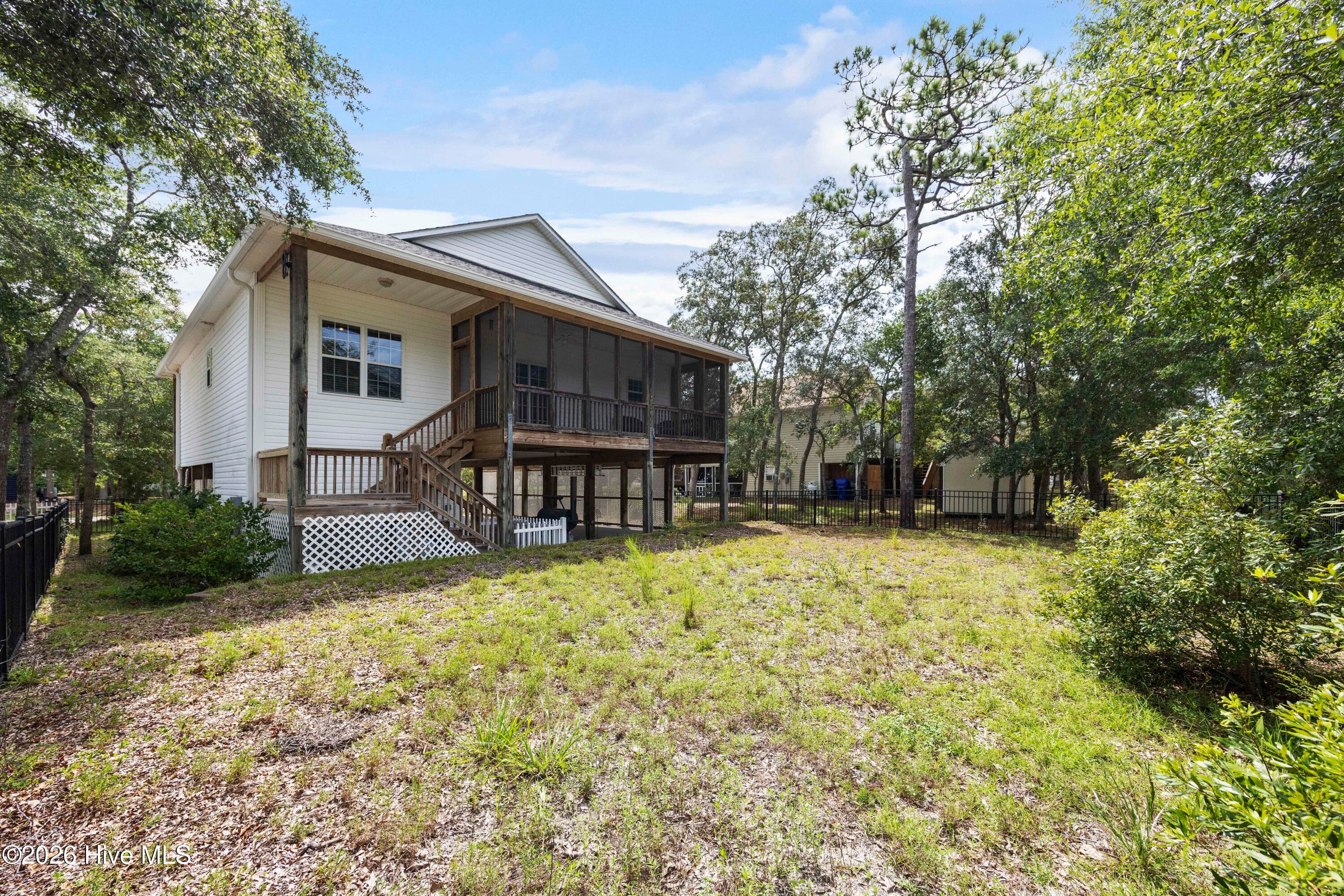 BACK YARD overlooked by Screened Porch - 225 NE 39th Street, Oak Island, NC 28465