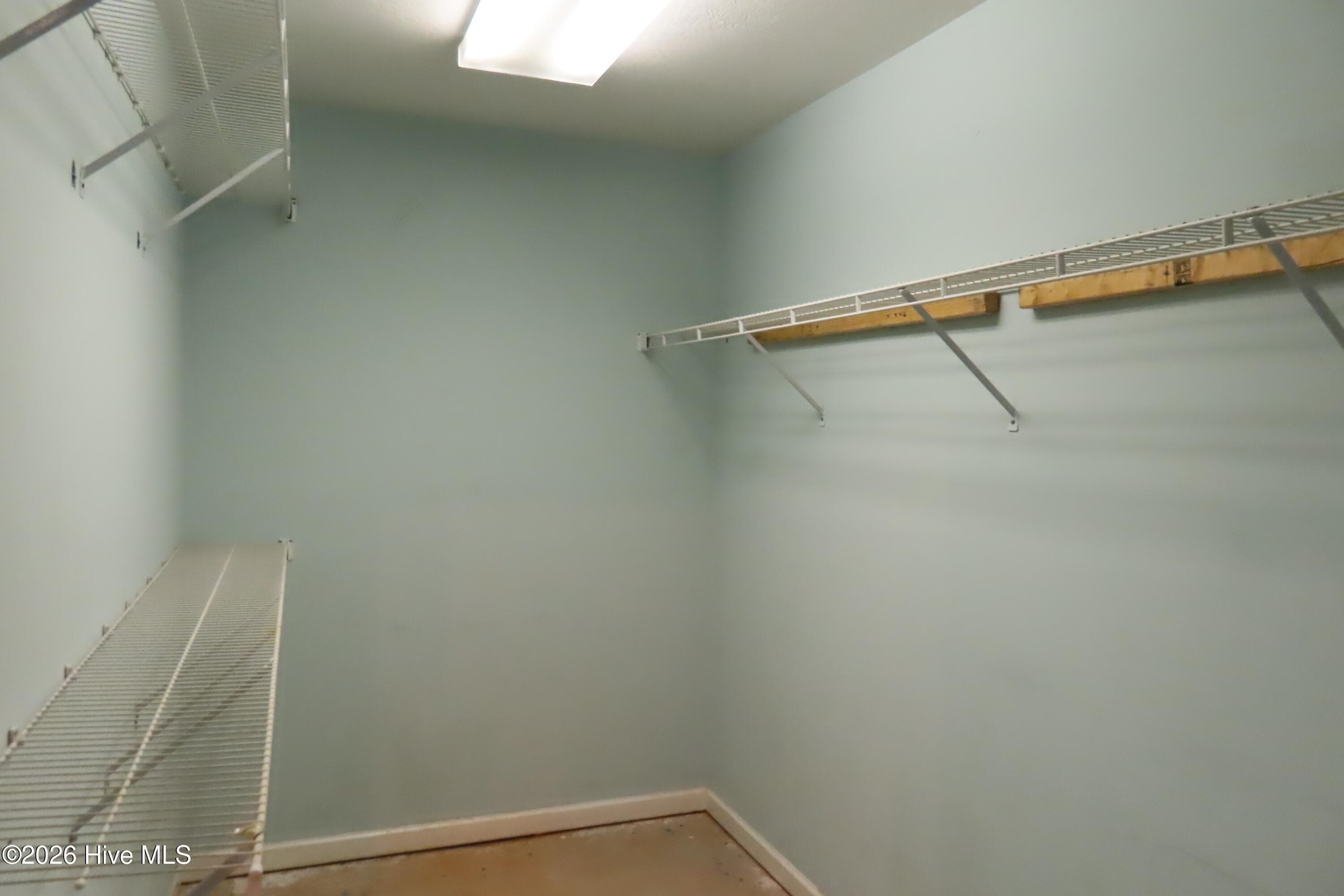 Primary walk-in closet - 492 Granite Point, Augusta, GA 30907