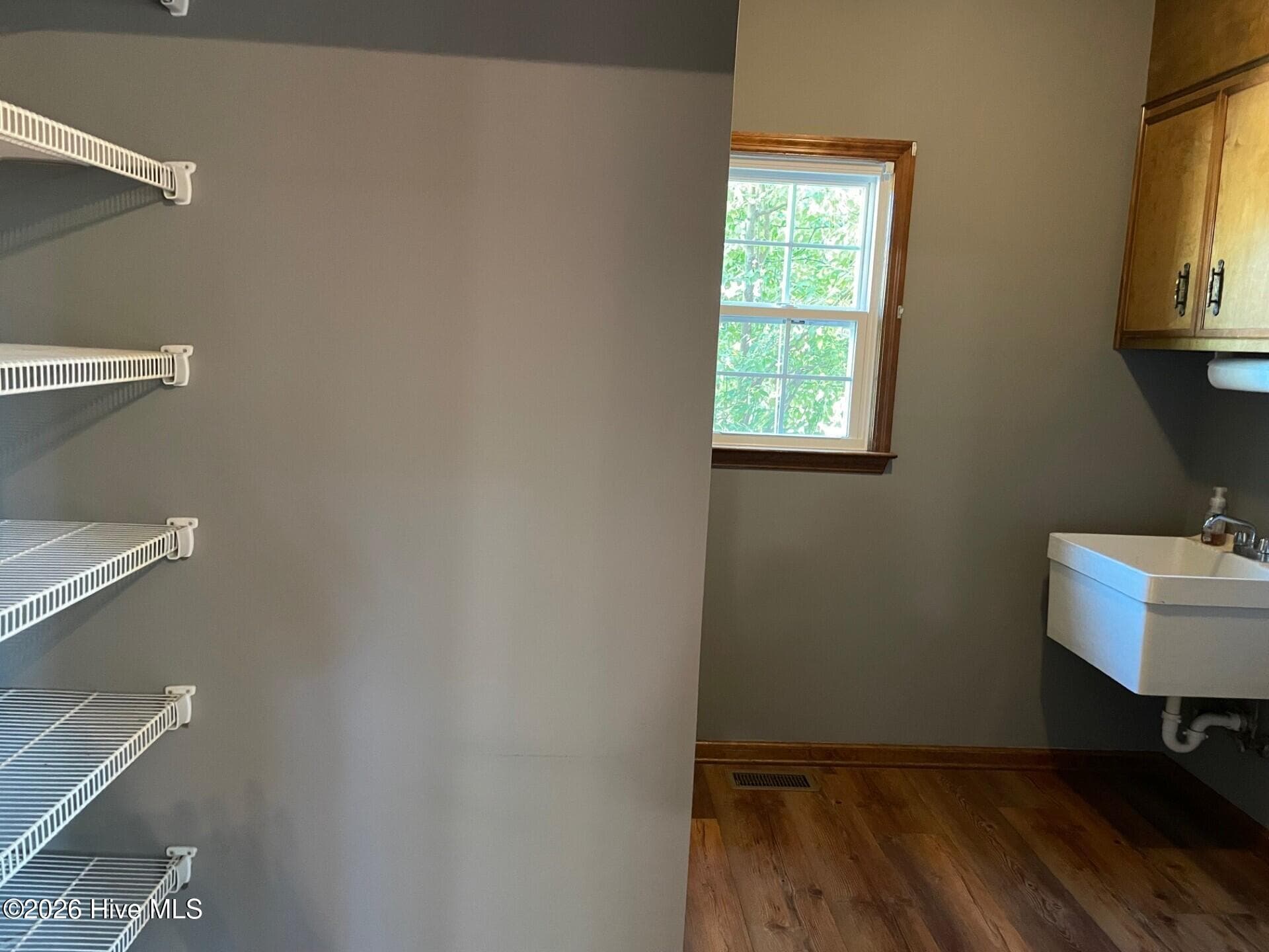 Shelving and sink in laundry - 4164 Quail Springs Circle, Augusta, GA 30907