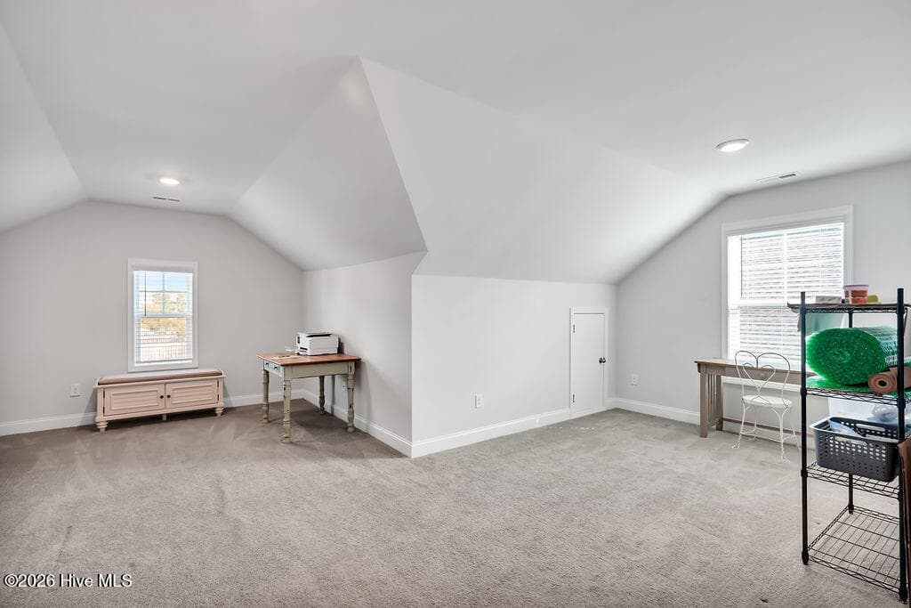 This large and versatile Bonus room is equipped with separate dedicated high-speed internet perfect for gaming and media. With a 2nd floor bedroom and full bath nearby, this space could make a terrific den and/or office, craft or playroom as well. *Virtually staged to show options. - 142 Rice Marsh Way, Wilmington, NC 28412