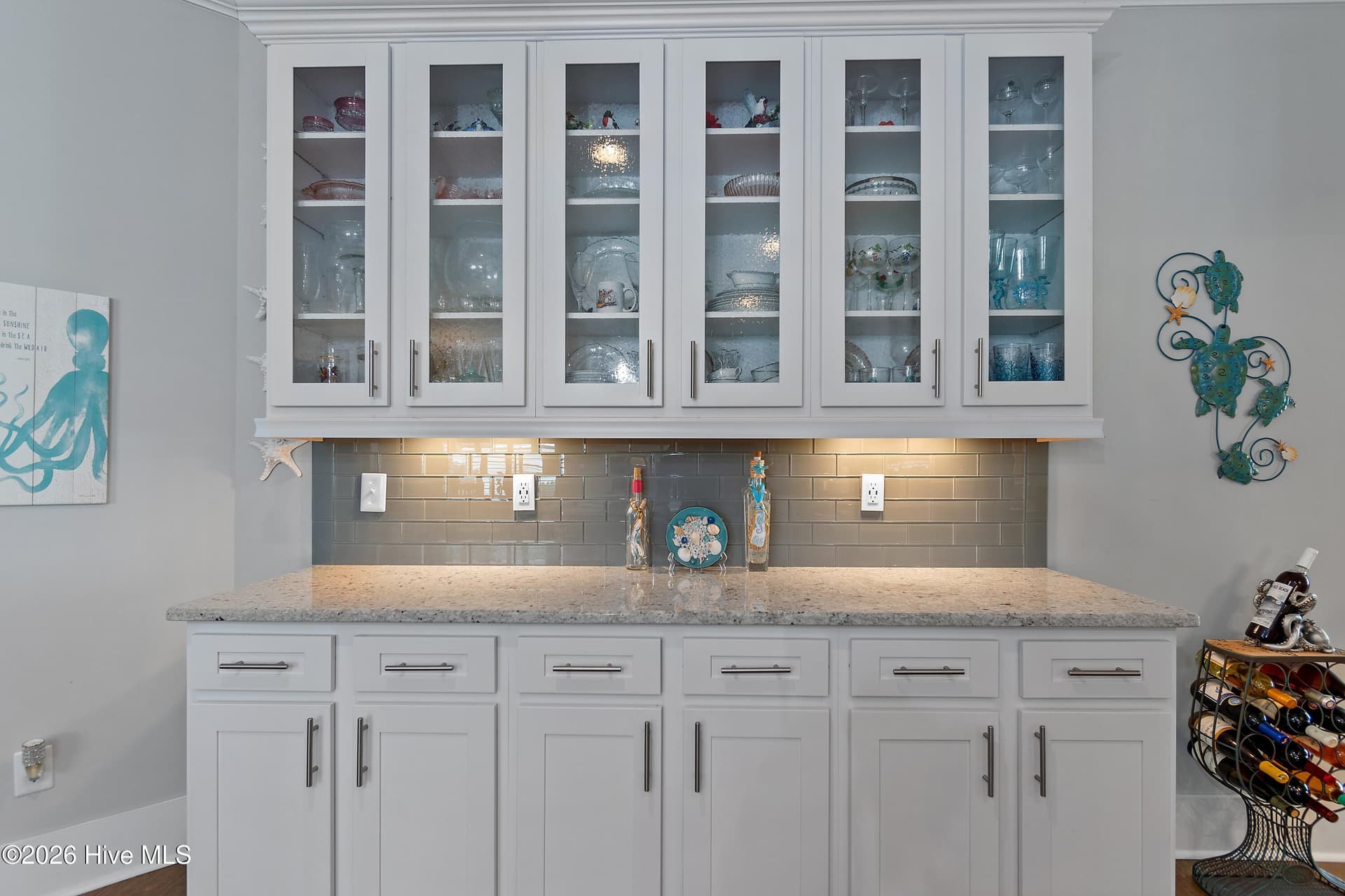 Seeded glass accent cabinets. - 6358 Bryson Drive SW, Ocean Isle Beach, NC 28469