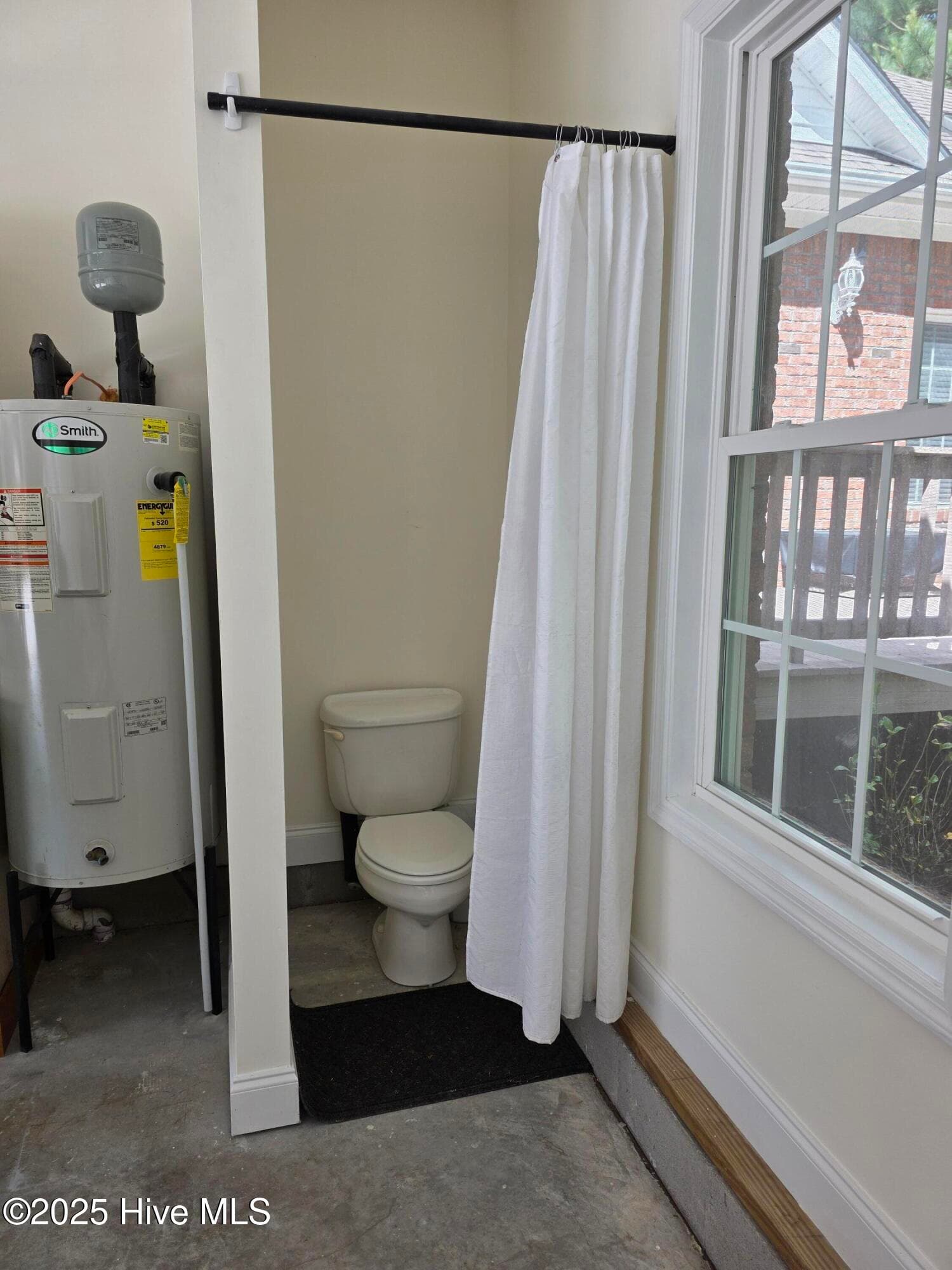 Toilet nook in garage - 219 Drake Landing, New Bern, NC 28560