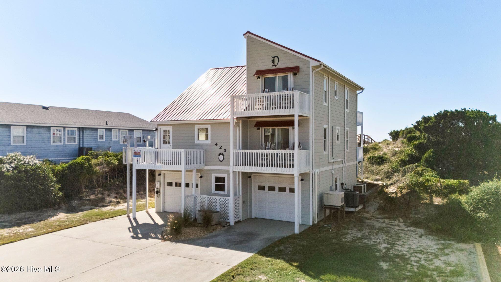 Single Family Residence at 425 Caswell Beach Road, Oak Island, NC 28465, photo 4 of 73