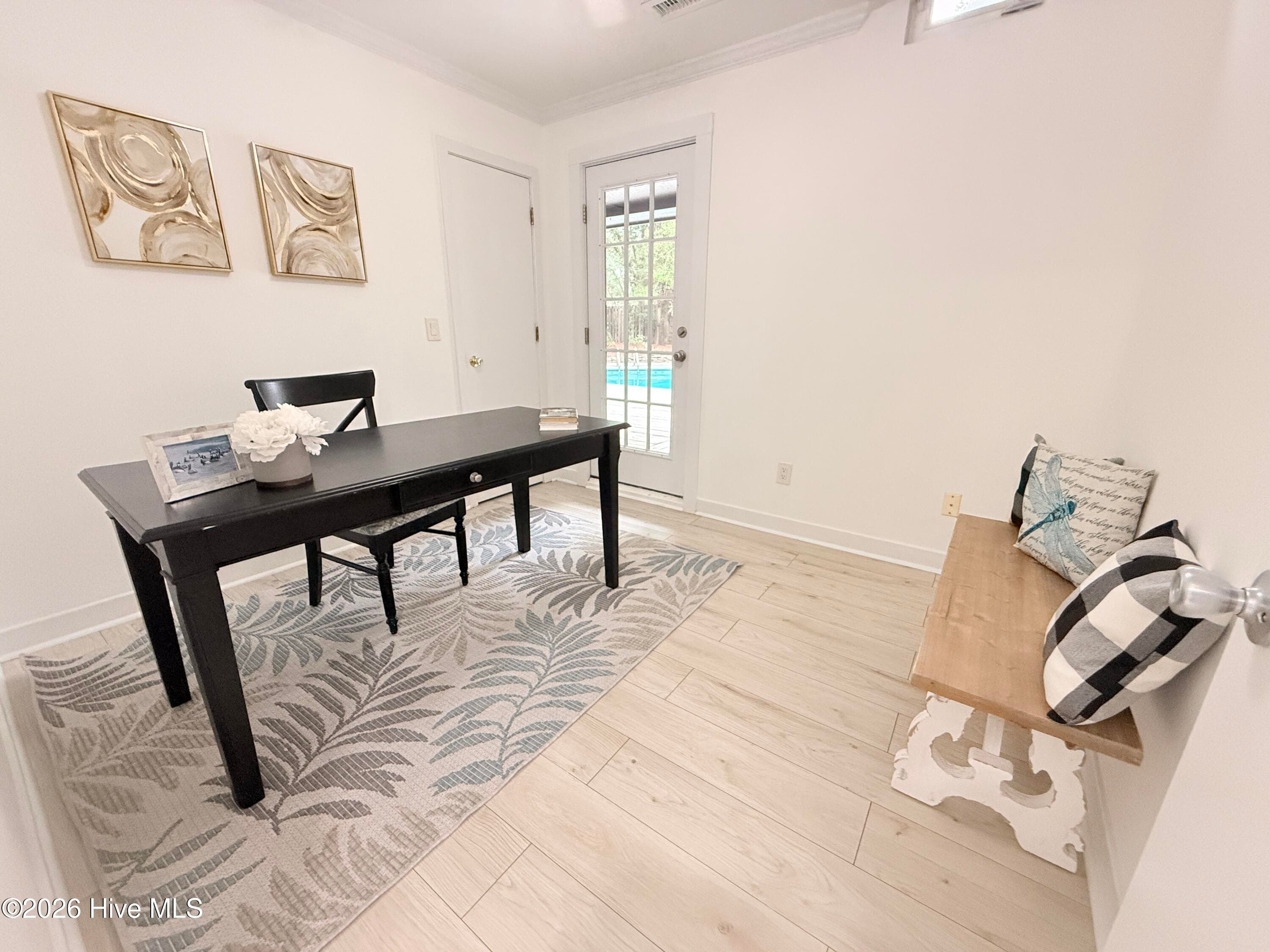 This versatile room is currently set up as an office but could house a twin over full bunk bed and has walk in closet and door to the pool! - 1001 Hunting Ridge Road, Wilmington, NC 28412