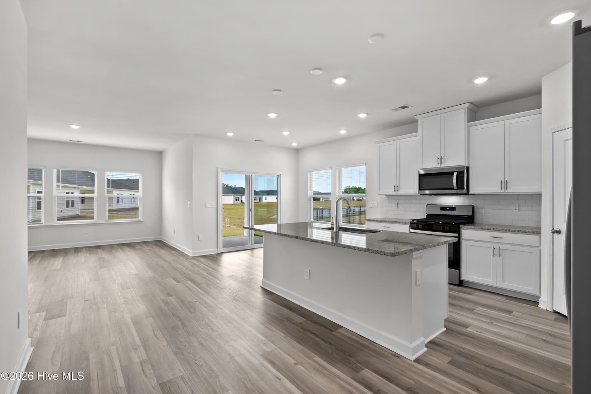 Photo is not of the actual home, but is an example photo of a completed home and may depict options and/or features that are not included - 4154 Generations Circle NW, Ash, NC 28420