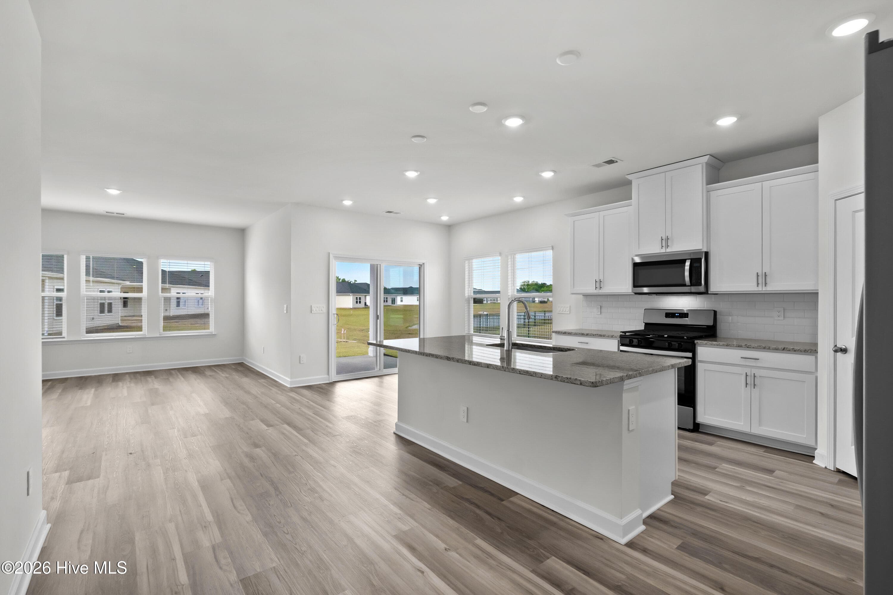 Photo is not of the actual home, but is an example photo of a completed home and may depict options and/or features that are not included - 4154 Generations Circle NW, Ash, NC 28420