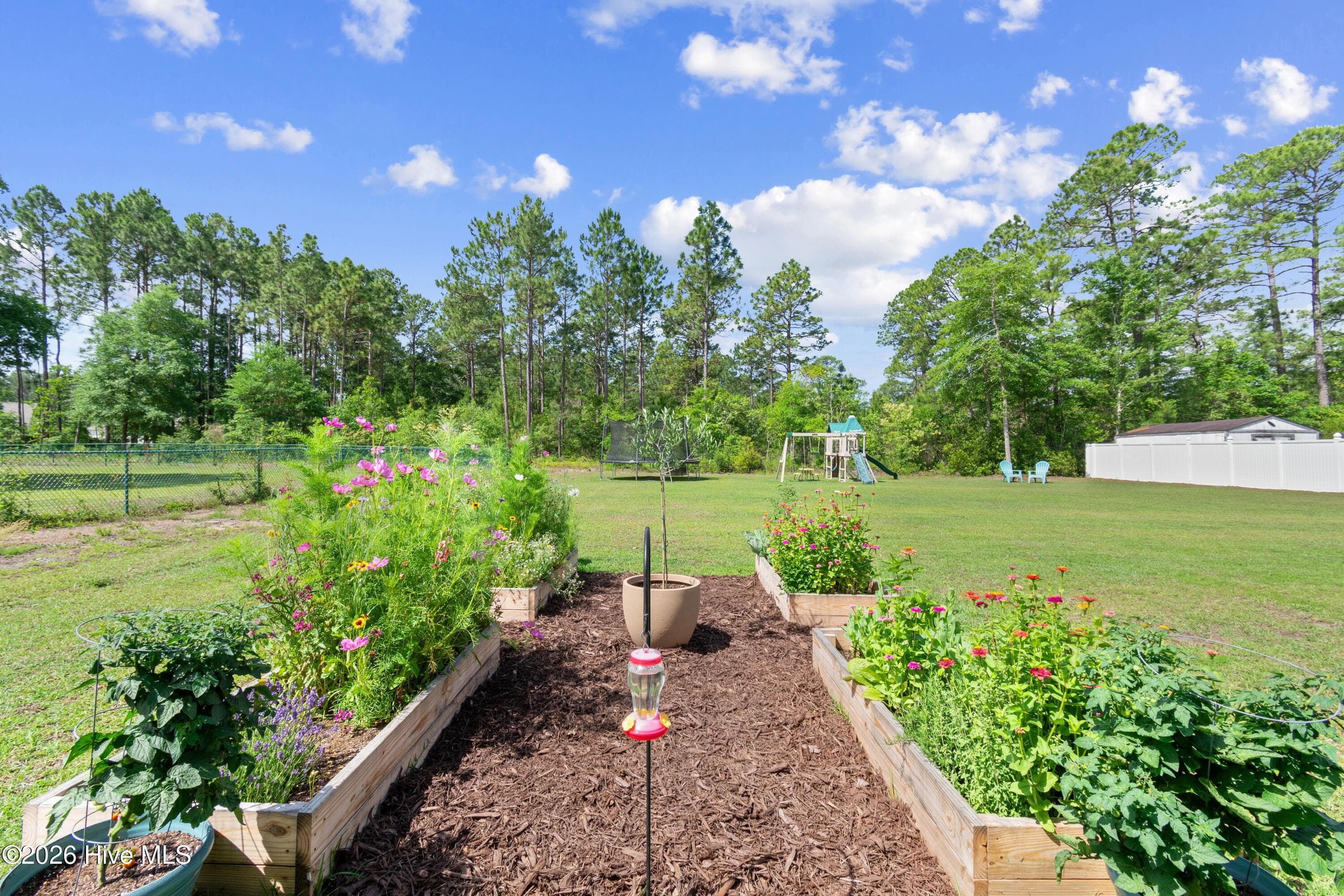 Expansive backyard with space for it all! - 299 Boundaryline Drive NW, Calabash, NC 28467