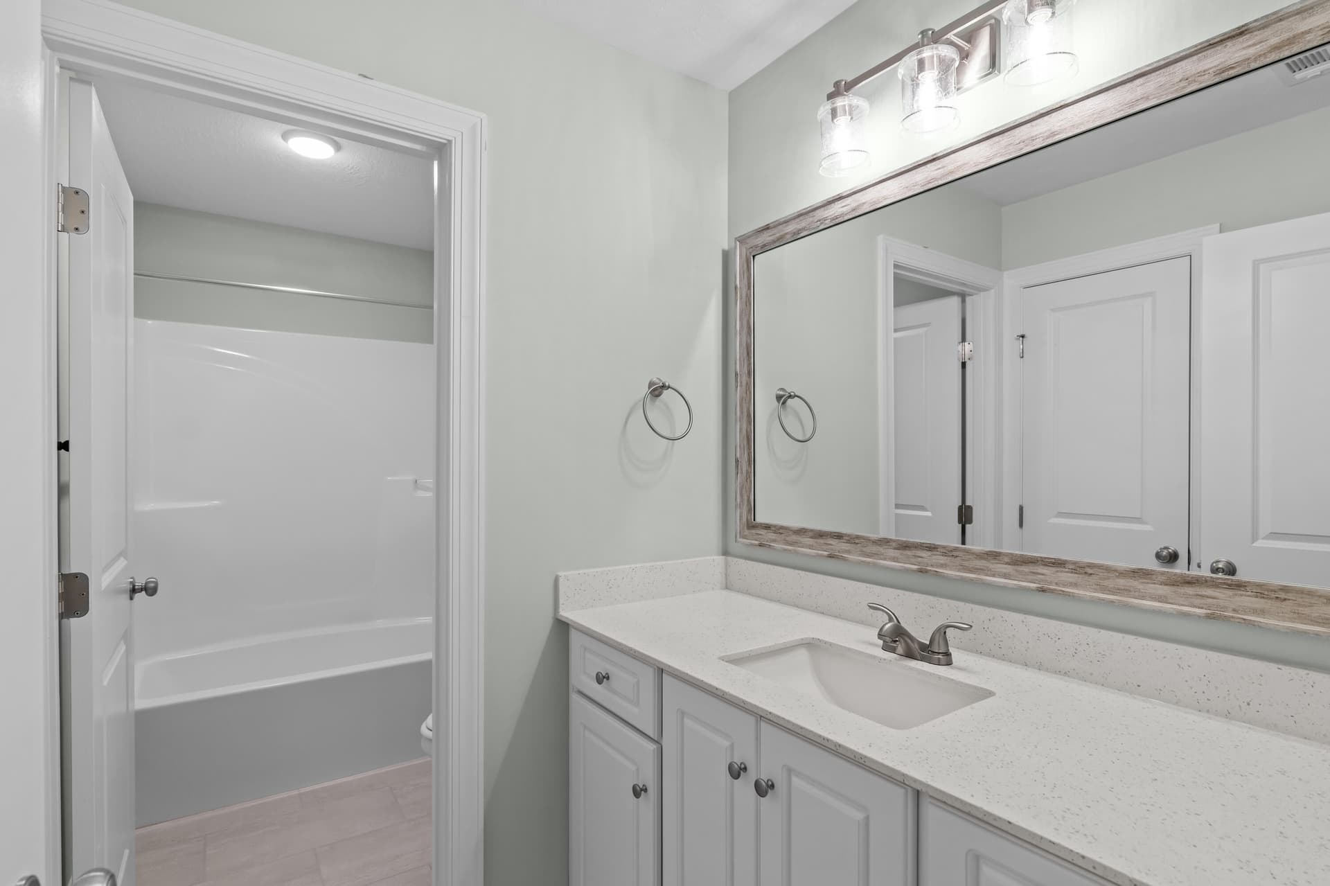 Guest Bathroom with Framed Mirror - 1340 Bellingham Drive, Beech Island, SC 29842