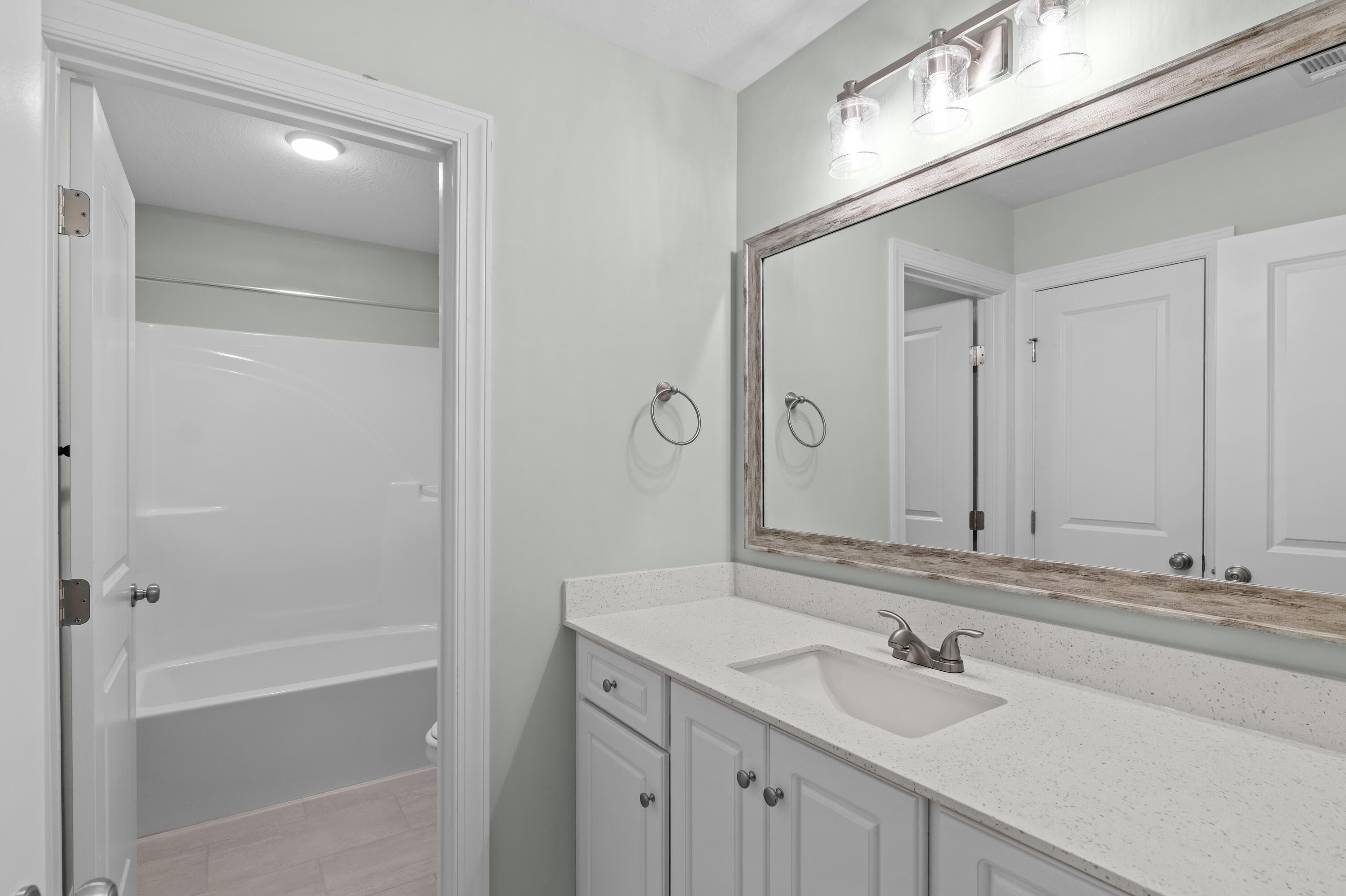 Guest Bathroom with Framed Mirror - 1340 Bellingham Drive, Beech Island, SC 29842