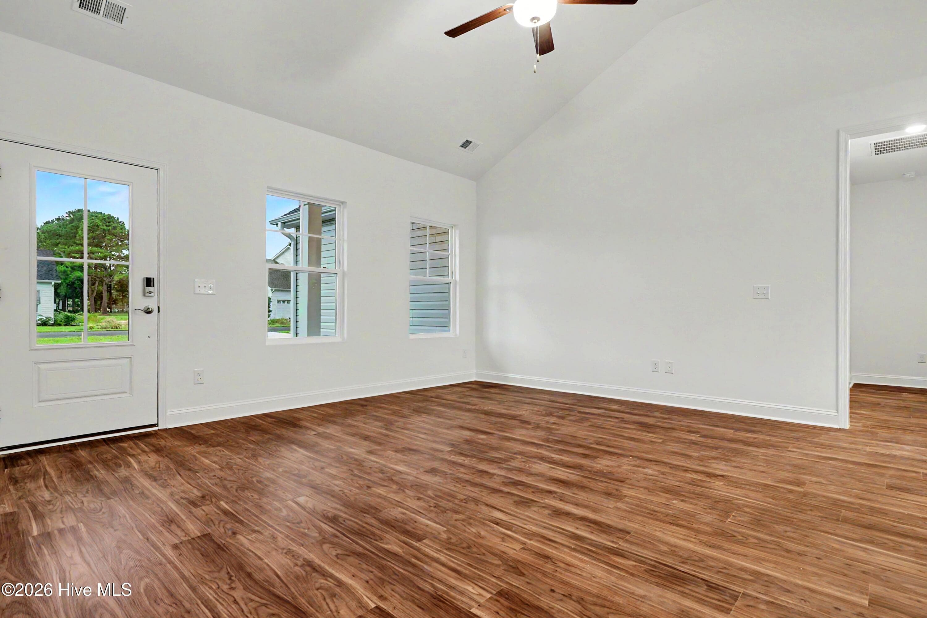 Great room with vaulted ceiling. - 2111 Cregan Cove SW (Lot 19), Ocean Isle Beach, NC 28469