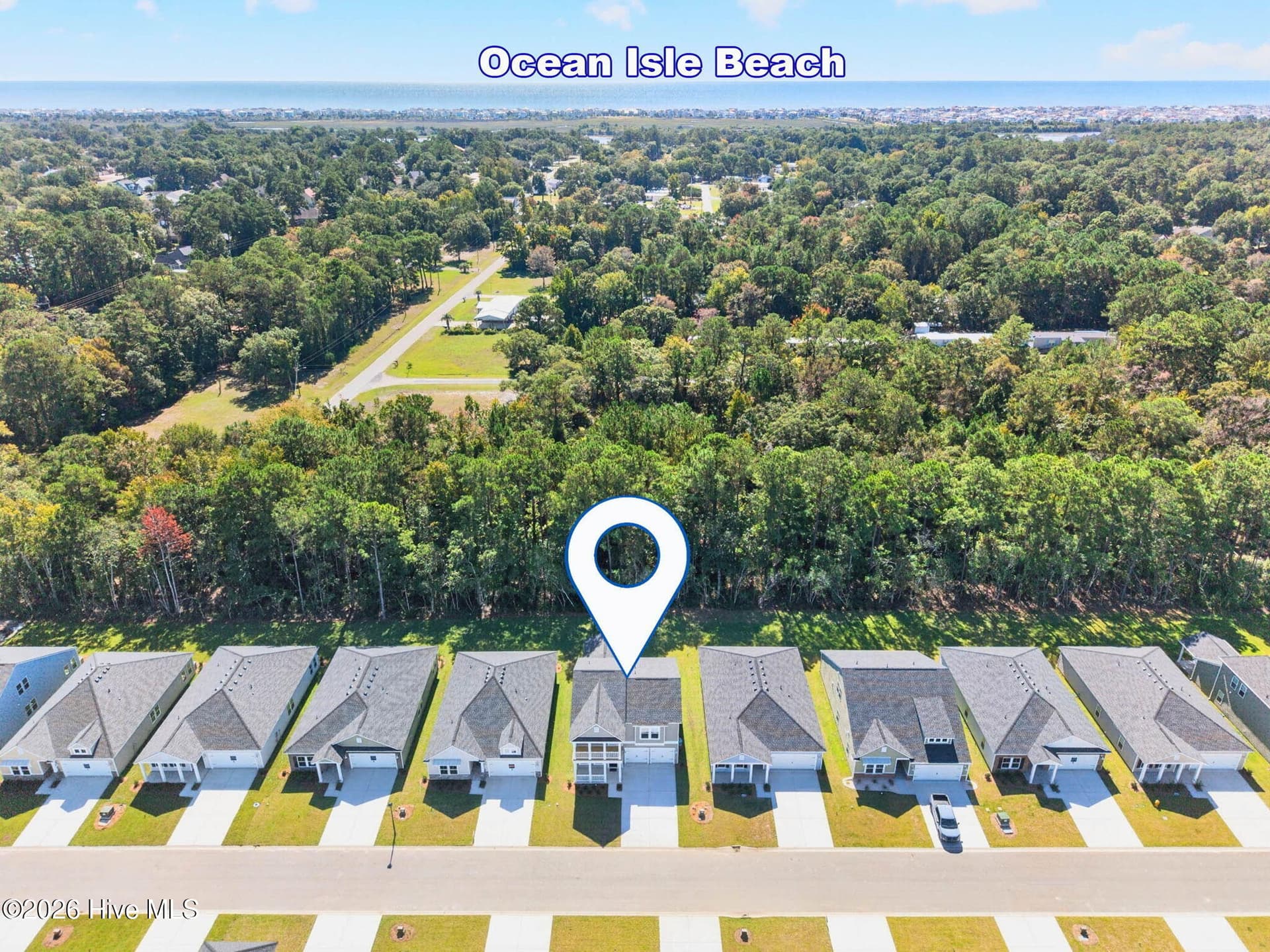 Aerial view highlighting the home's location in Wood Stork Landing near Ocean Isle Beach. - 3447 Sandhill Crane Drive SW, Ocean Isle Beach, NC 28469