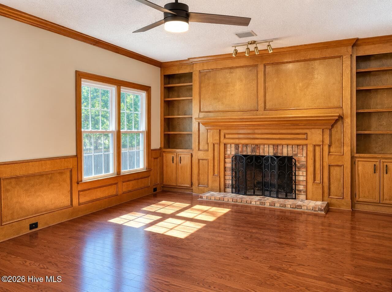 Cozy FR/Den w/beautiful paneling, built ins, gas f/p and updated flooring. - 4164 Quail Springs Circle, Augusta, GA 30907