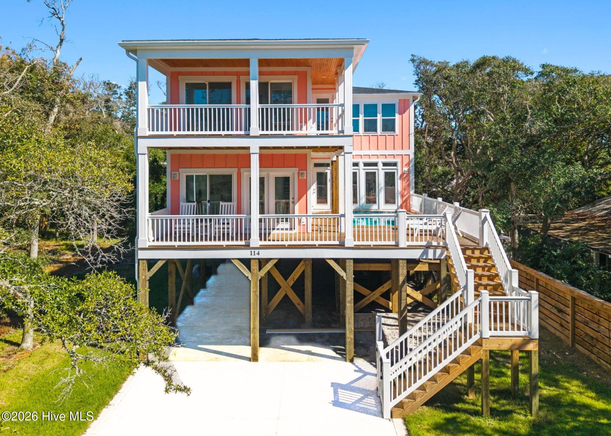 Single Family Residence at 114 SE 75th Street, Oak Island, NC 28465, photo 2 of 164