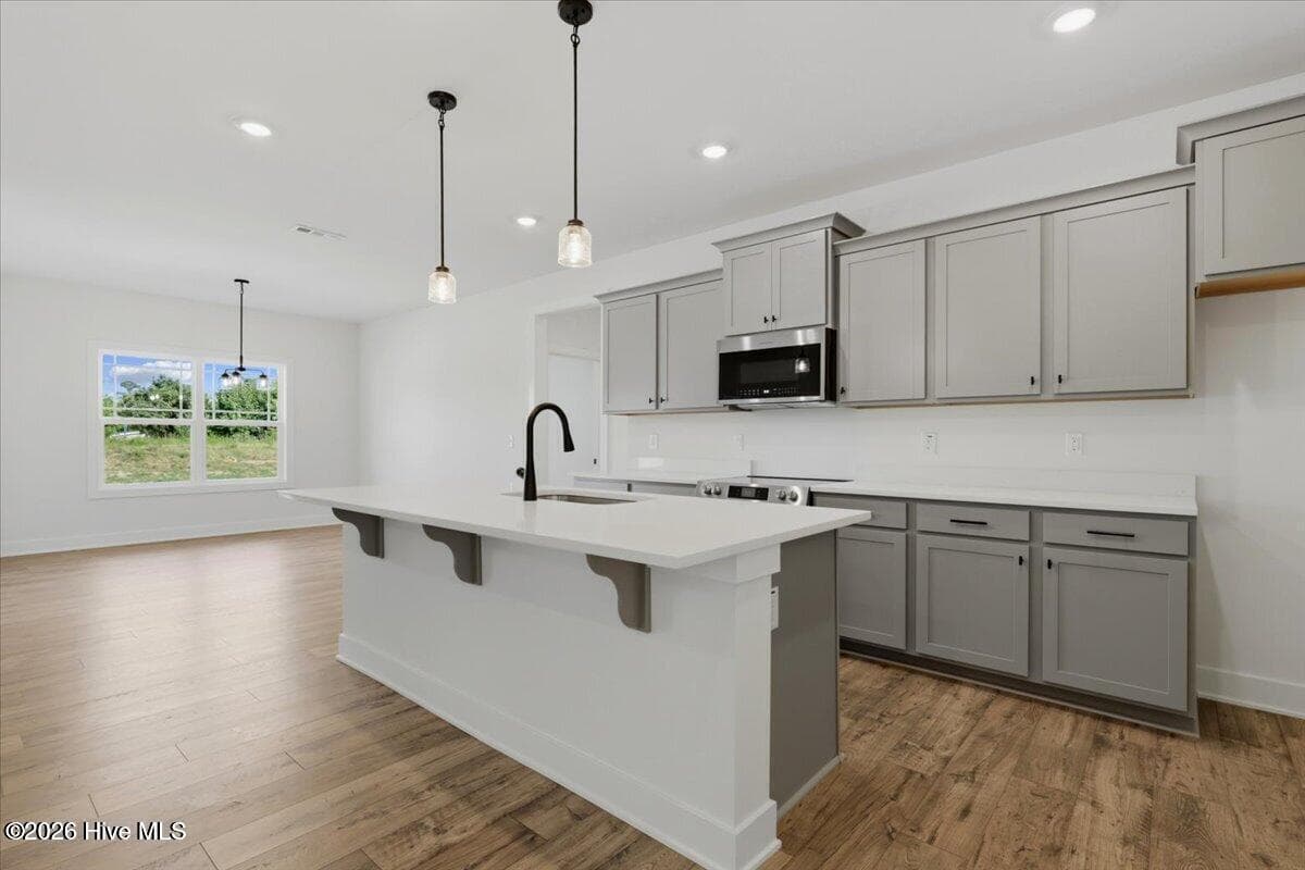 Photo of home same floor plan from different community. Actual colors and options may vary. - 1119 Barkentine Drive Lot Fh040, New Bern, NC 28560