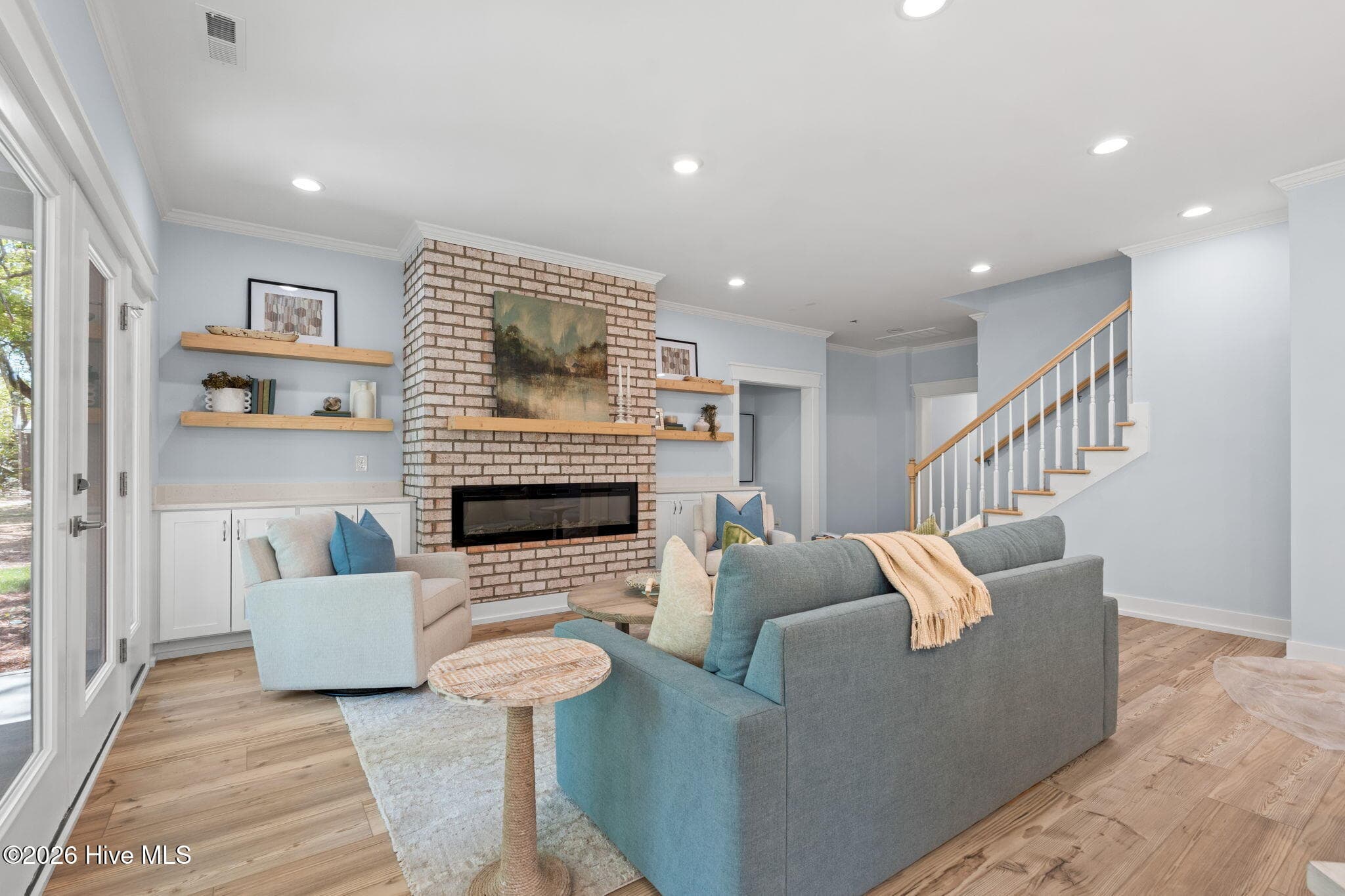 Photos of a staged model of the exact same plan - 312 NE 58th Street, Oak Island, NC 28465