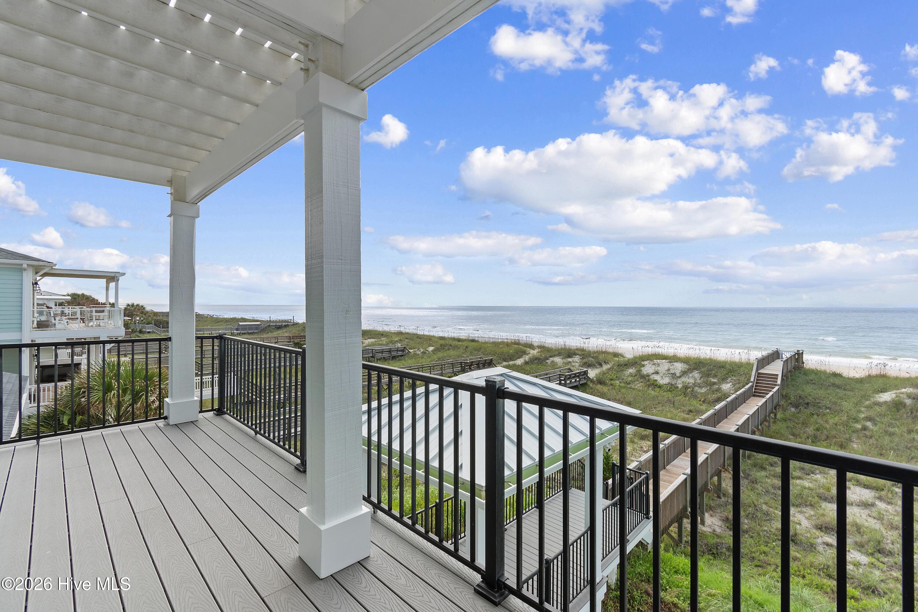 298 E First St. Second Floor Covered Balcony - 298 E First Street, Ocean Isle Beach, NC 28469