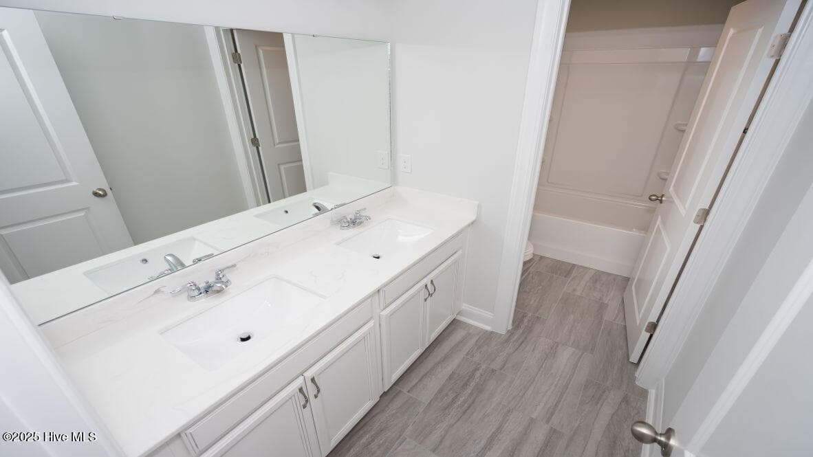 Photo is similar to actual home. Home is currently under construction. Features, colors and options may be different from those shown in representative photos. Call for detailed information. - 3221 Butterfly Ginger Street Lot 74, Leland, NC 28451