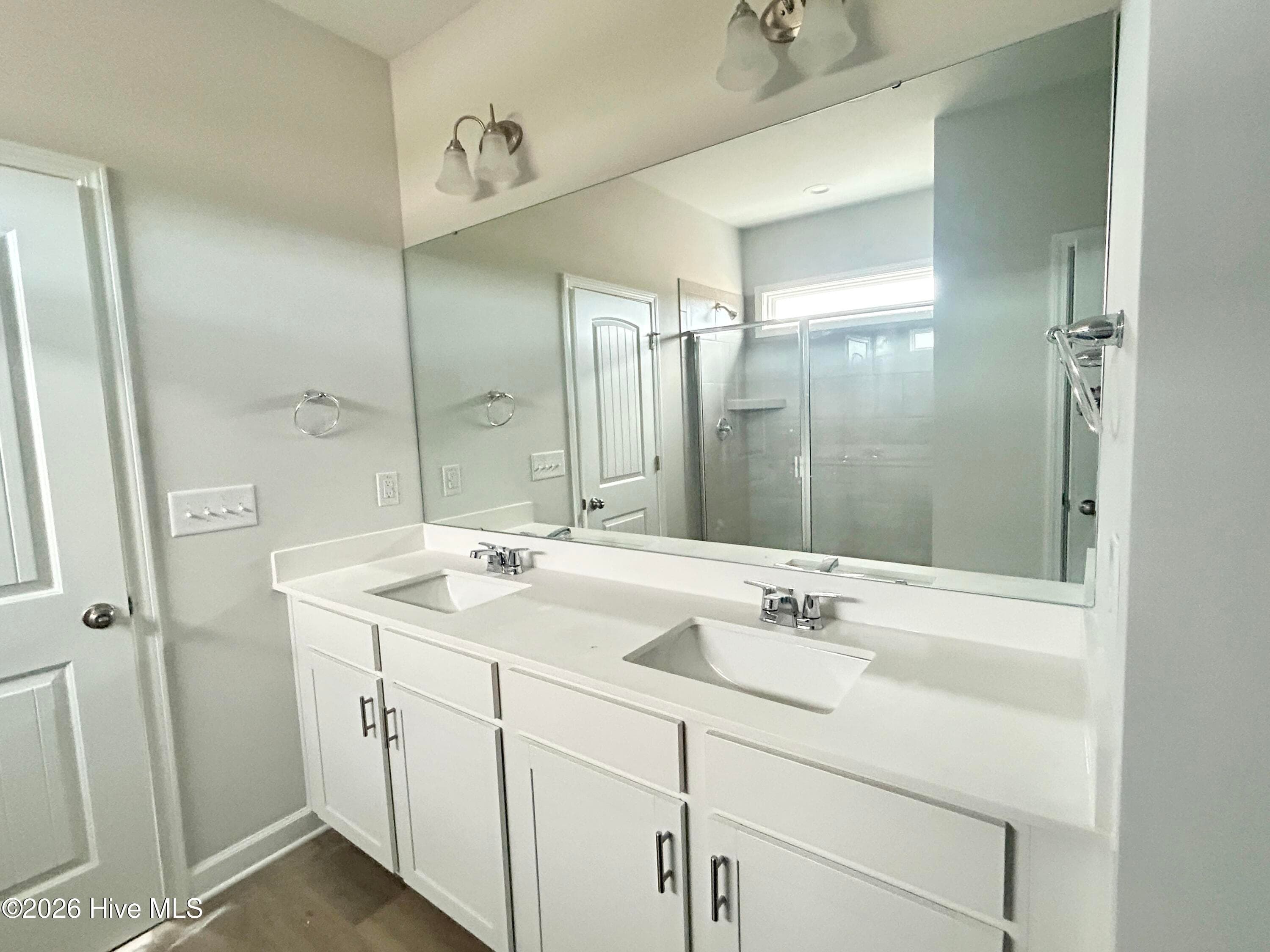 Primary suite features a Private Bathroom with Tile Shower and Large Walk-in Closet - 4212 Workman Loop 95, Leland, NC 28451